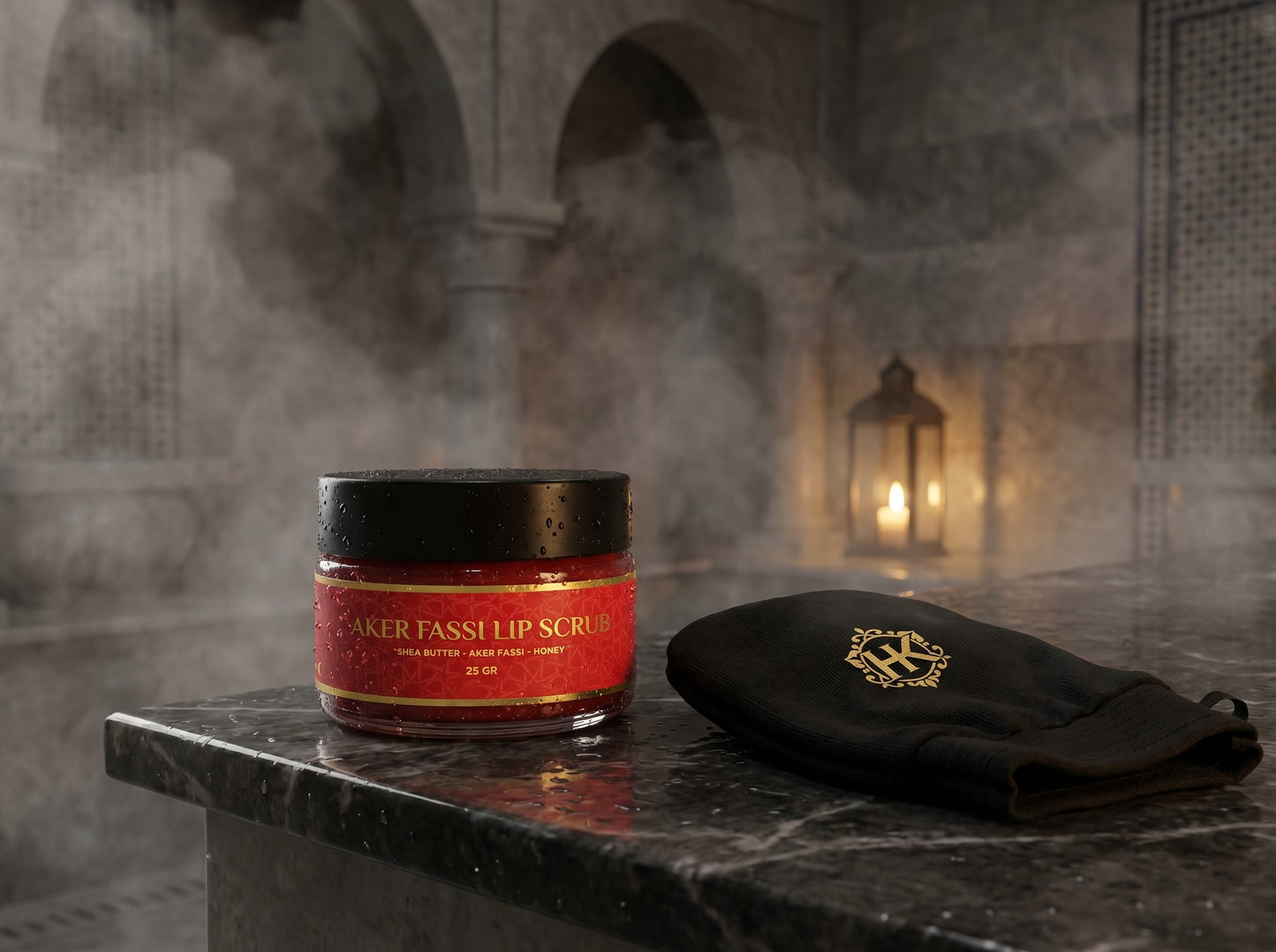 Lip scrub jar with black lid on a marble surface in a misty bathroom setting