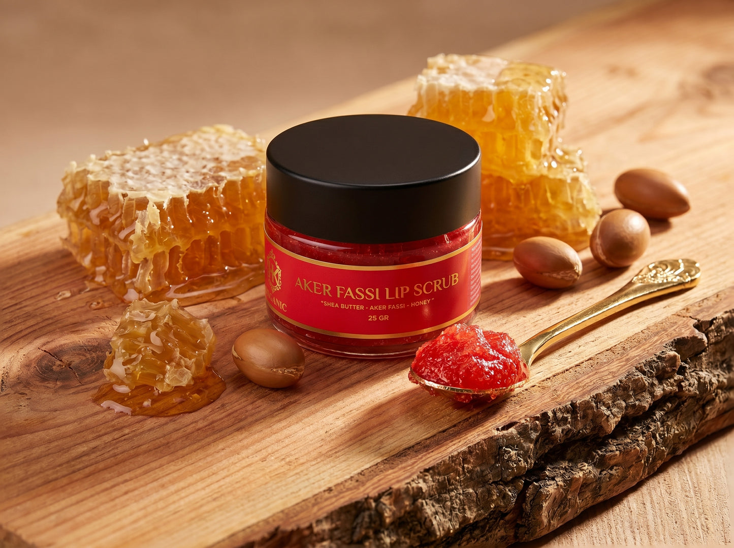 Jar of Aker Fassi lip scrub with honeycomb and nuts on a wooden surface