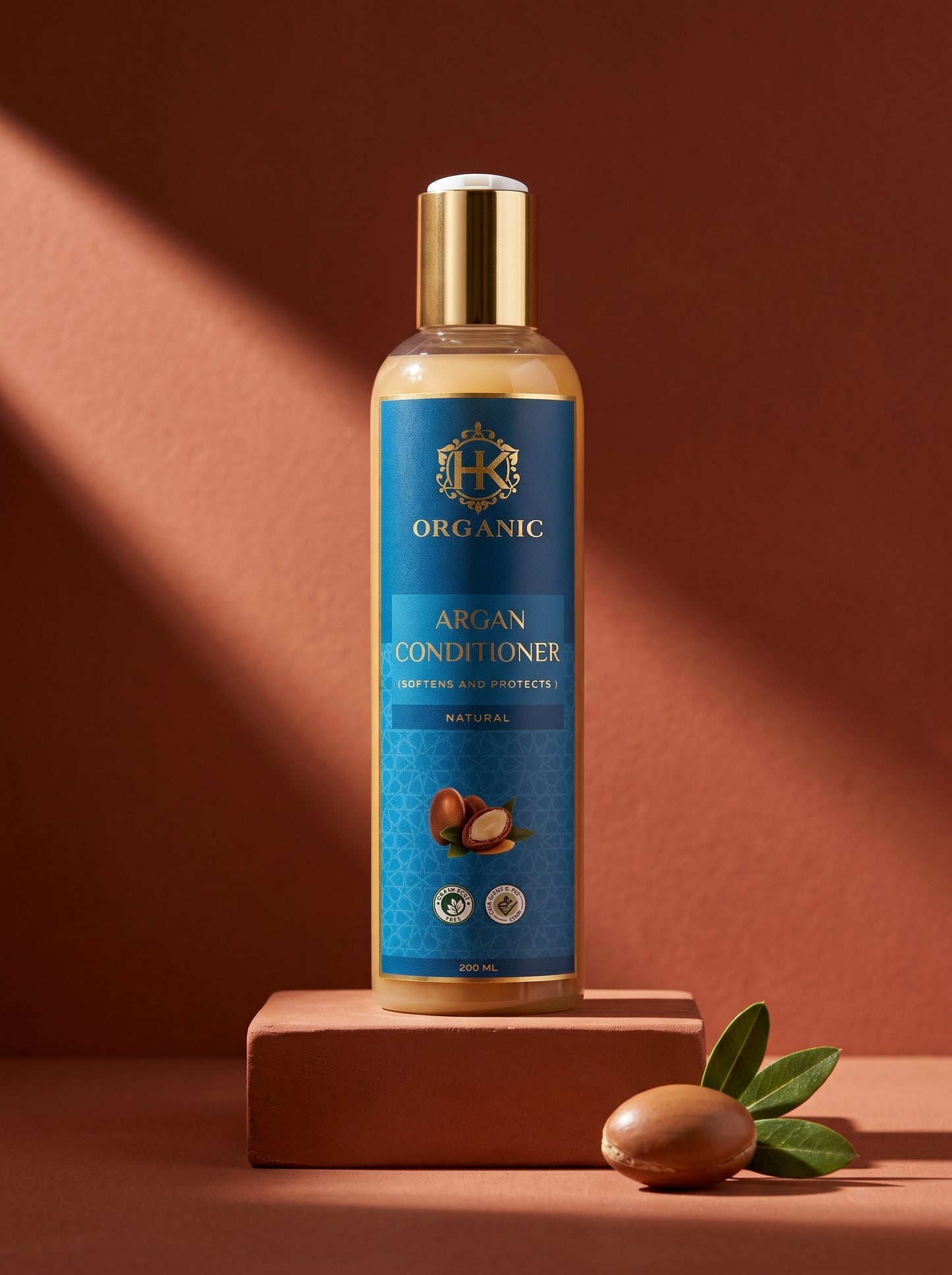 Organic argan conditioner bottle with blue label on a brown background