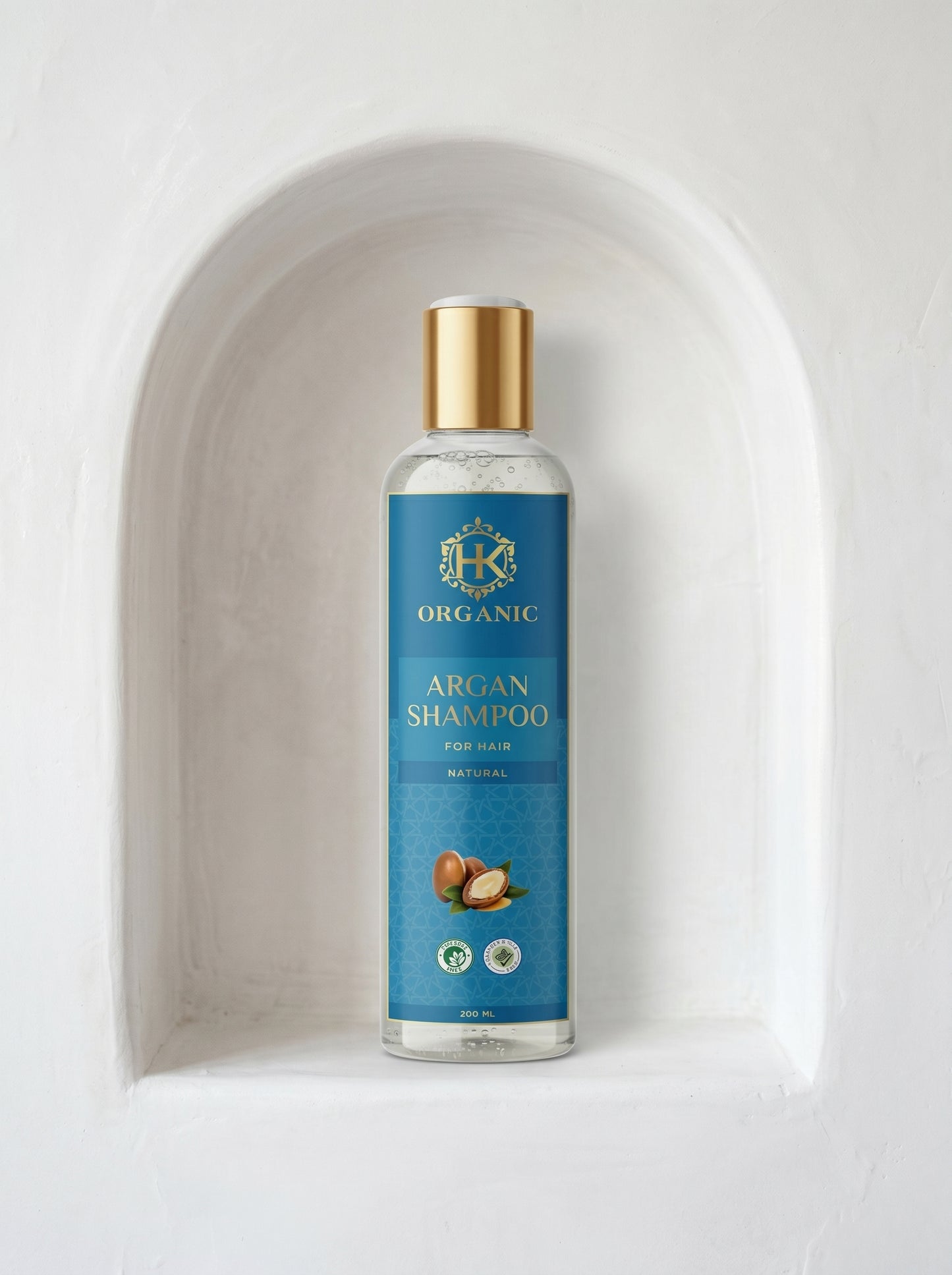 Bottle of Organic Argan Shampoo on a white background