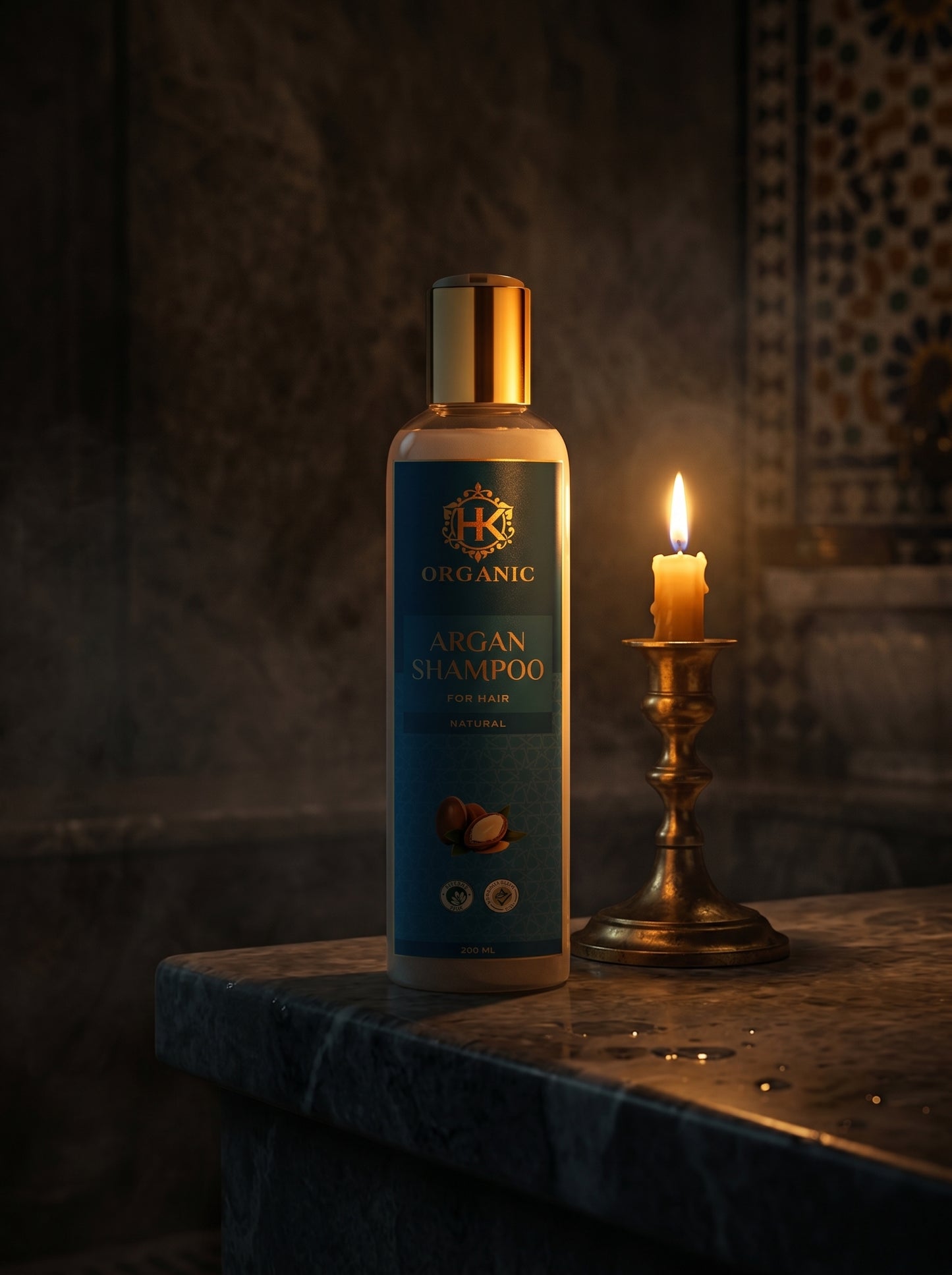 Bottle of organic argan shampoo on a marble surface with a candle in the background