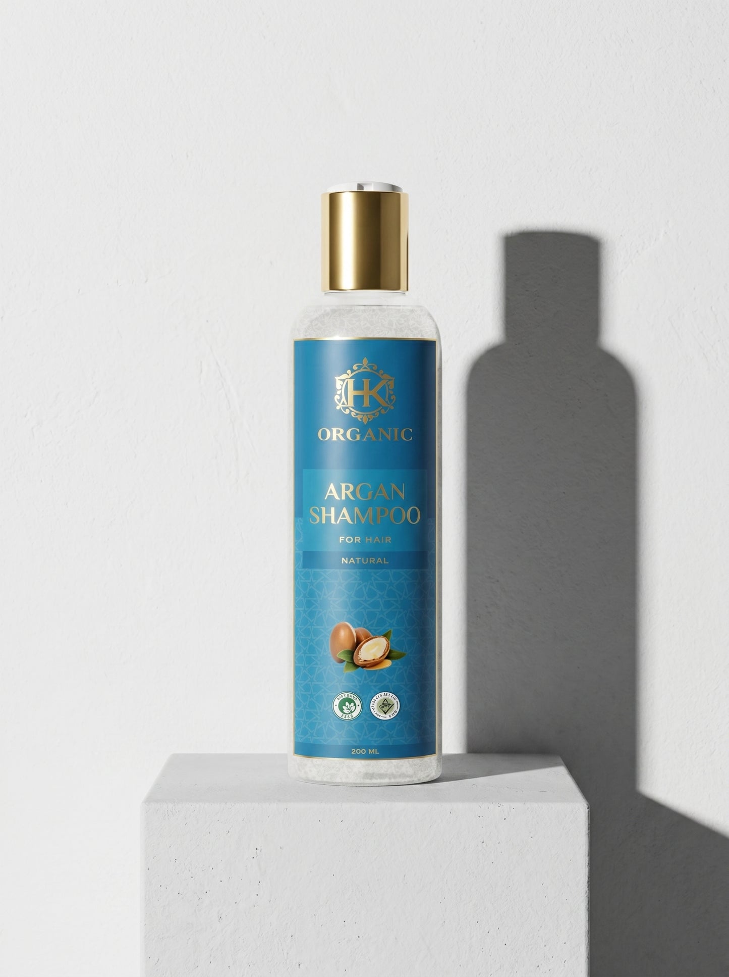 Shampoo bottle with blue label on a white background