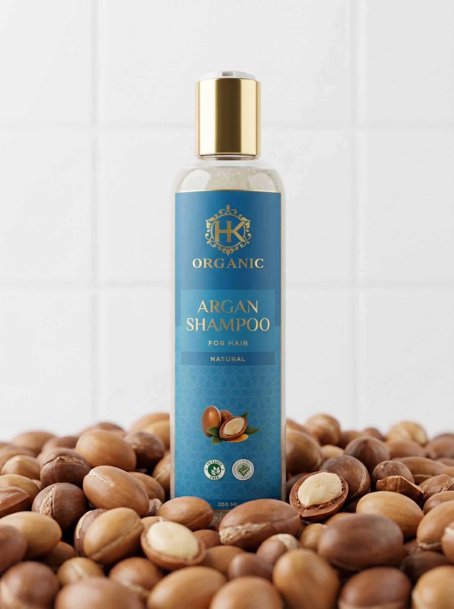 Organic argan shampoo bottle with argan seeds on a white background