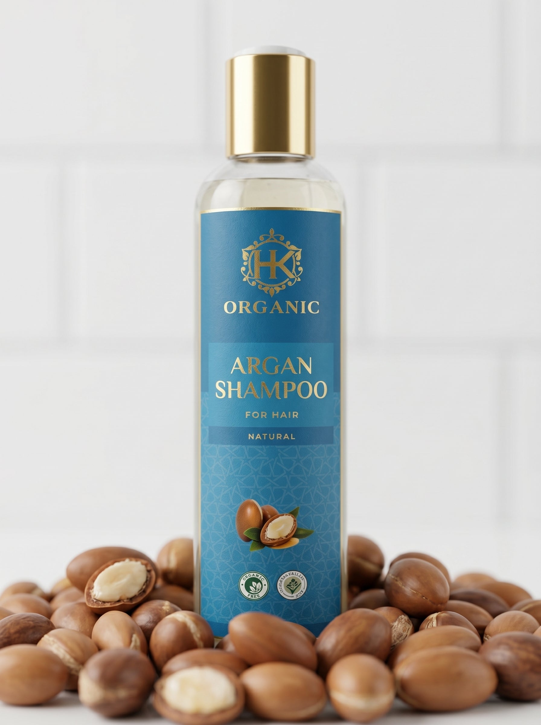 Shampoo bottle with argan oil nuts on a white background