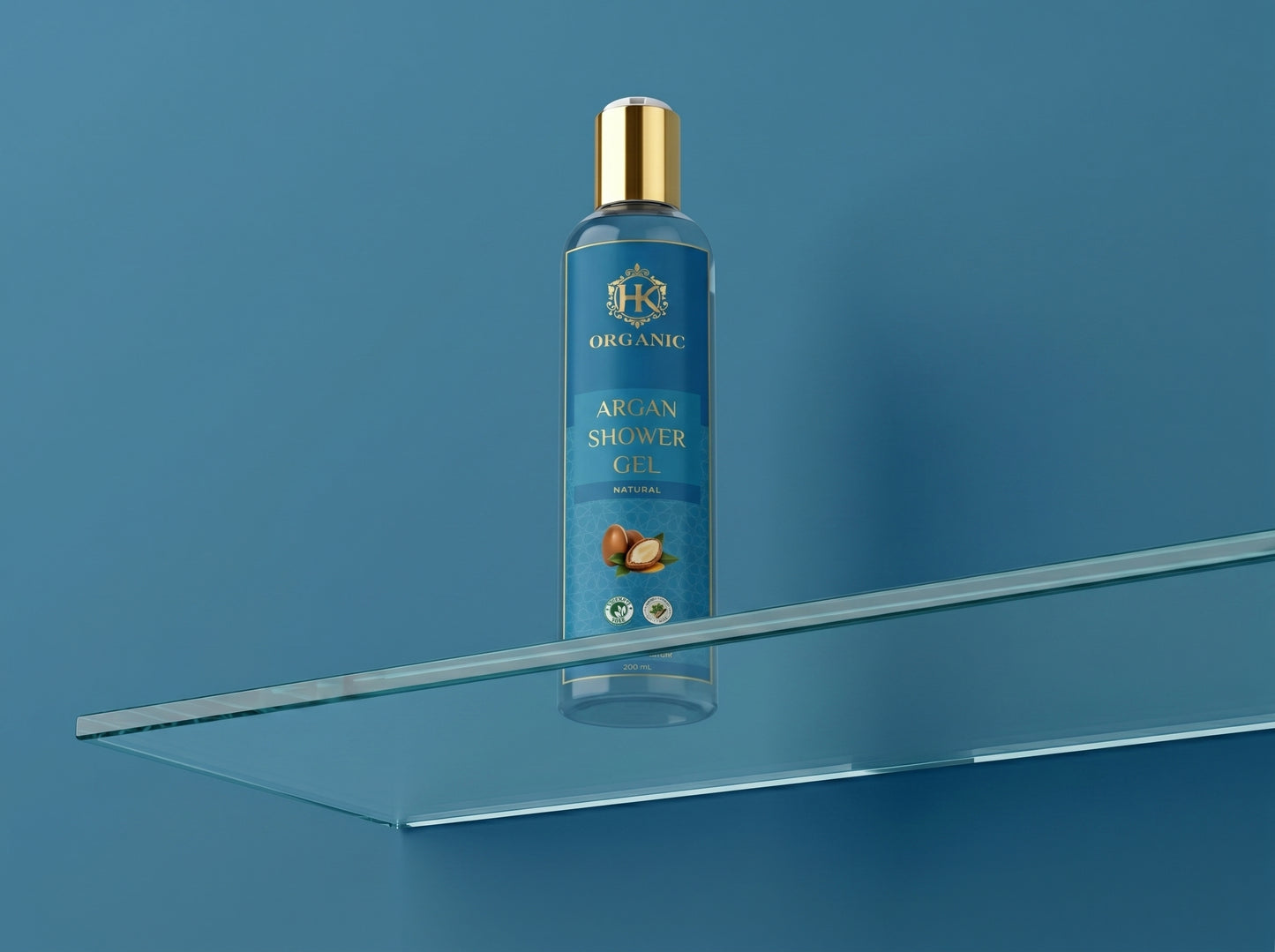 Blue bottle of organic argan shower gel on a clear shelf against a blue background