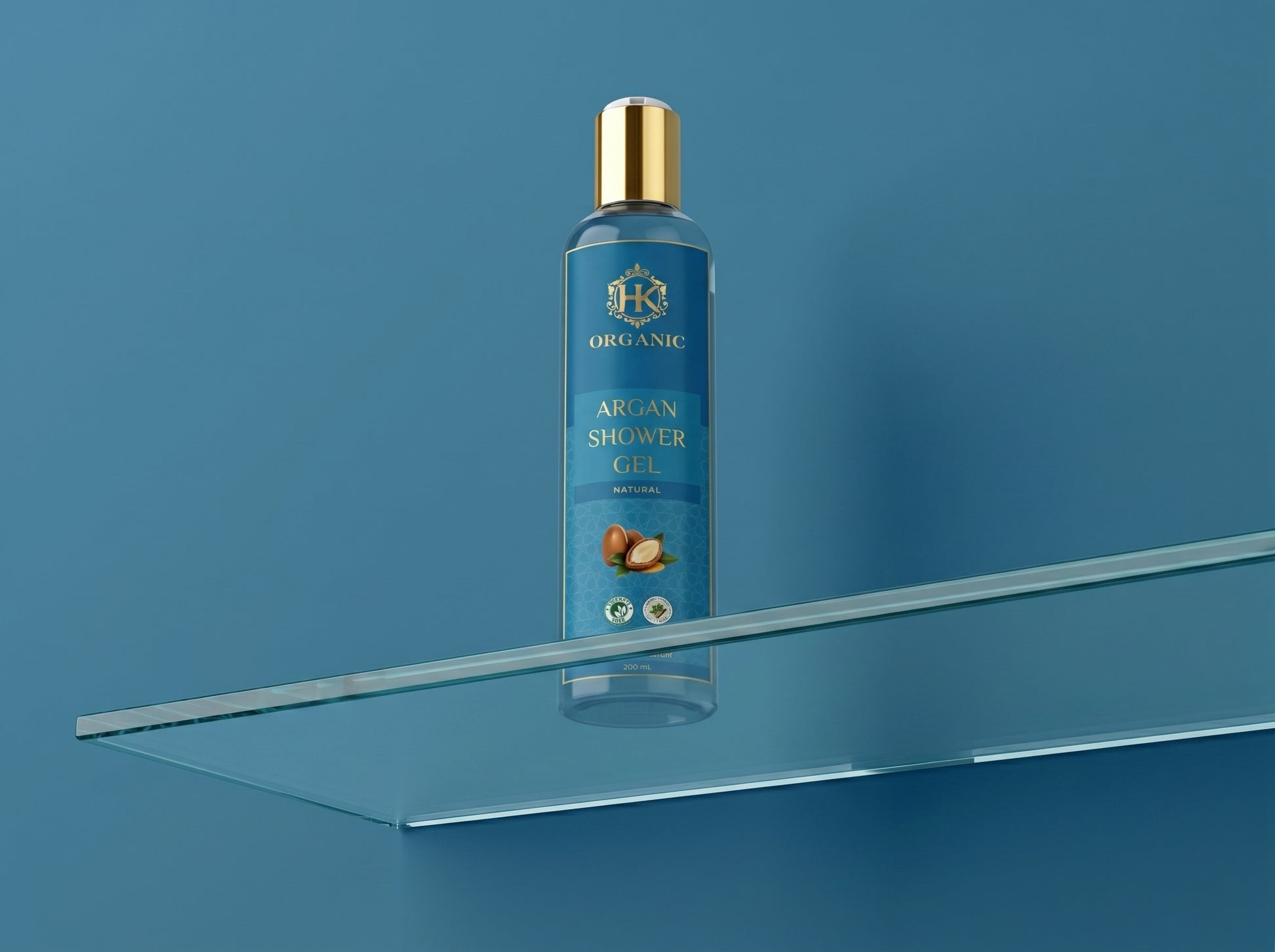 Blue bottle of organic argan shower gel on a clear shelf against a blue background