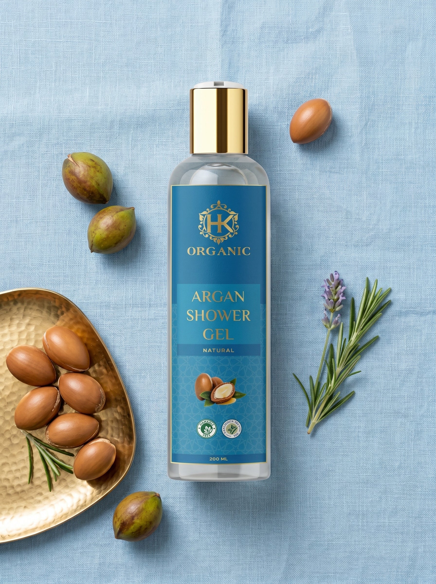 HK Organic Argan Shower Gel bottle with argan nuts and lavender on a blue background