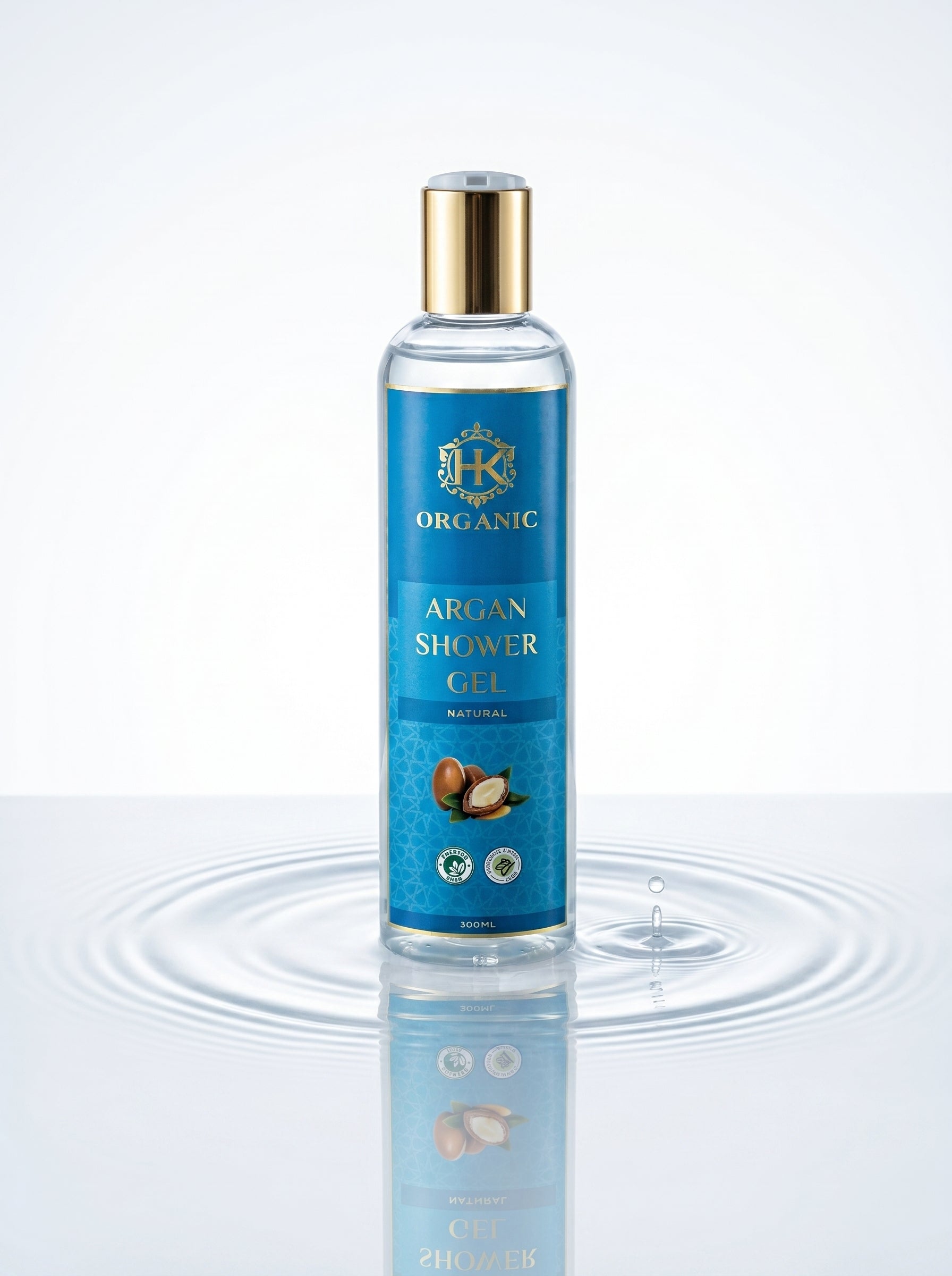 Bottle of organic argan shower gel with a blue label on a white background