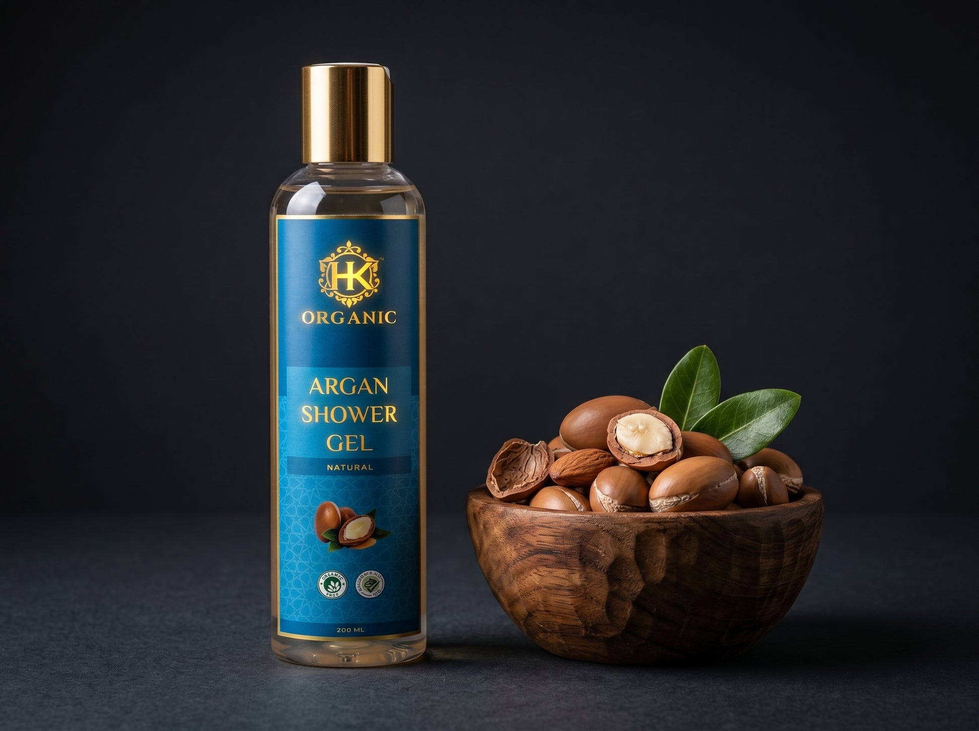 Argan shower gel bottle with a bowl of argan nuts on a dark background