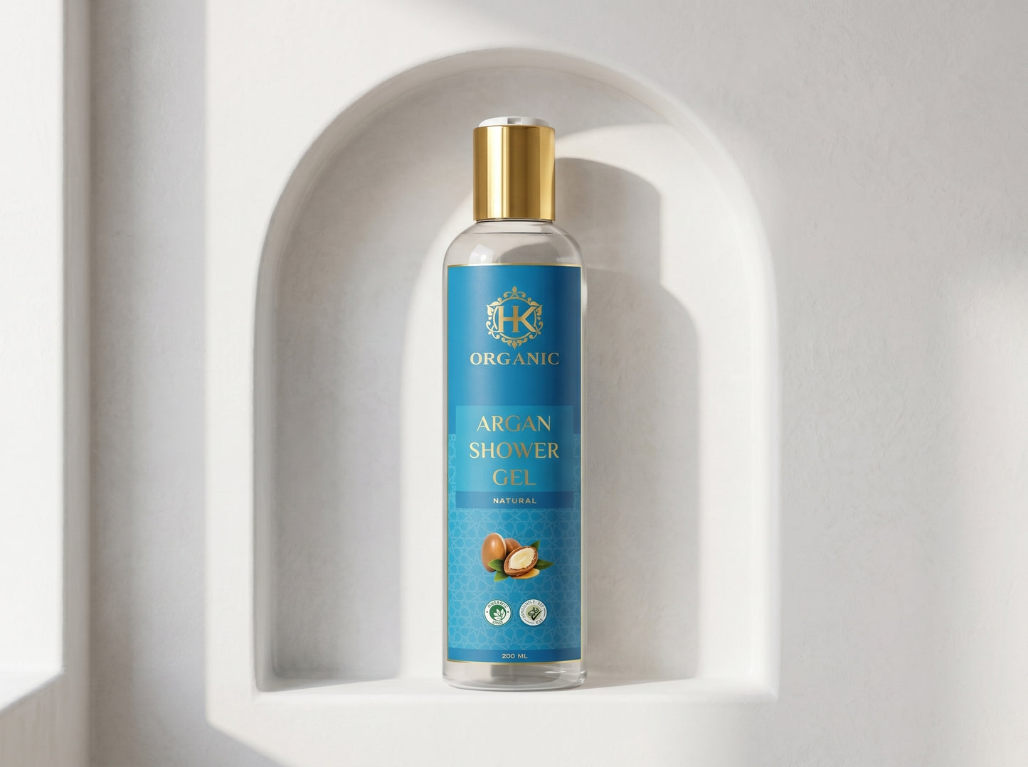 Bottle of organic argan shower gel on a white background