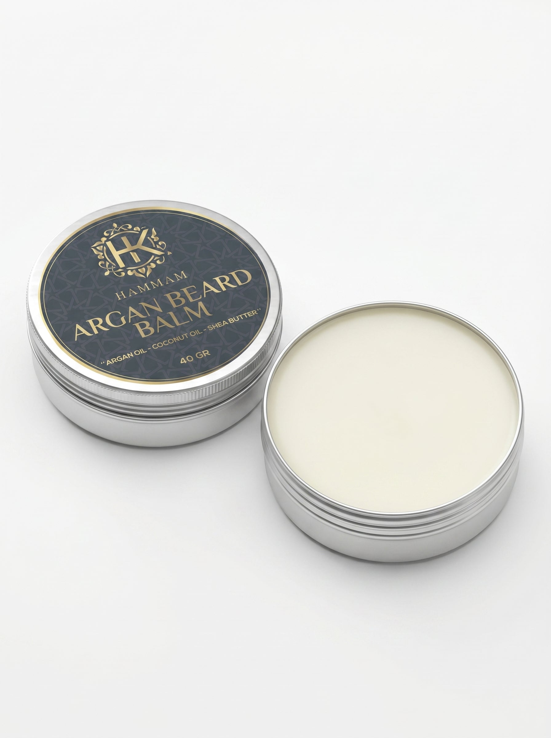 Open container of beard balm with a lid on a white background