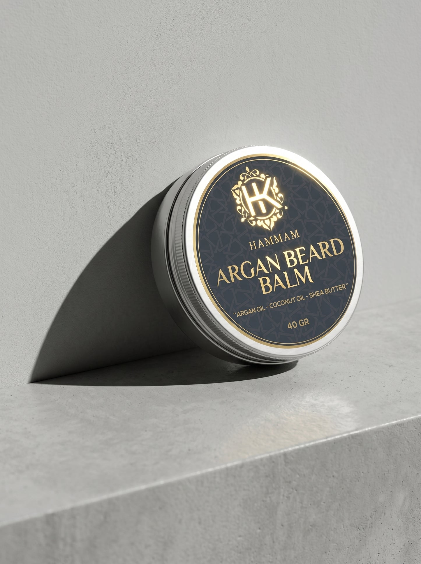 Hammam Argan Beard Balm container on a gray surface