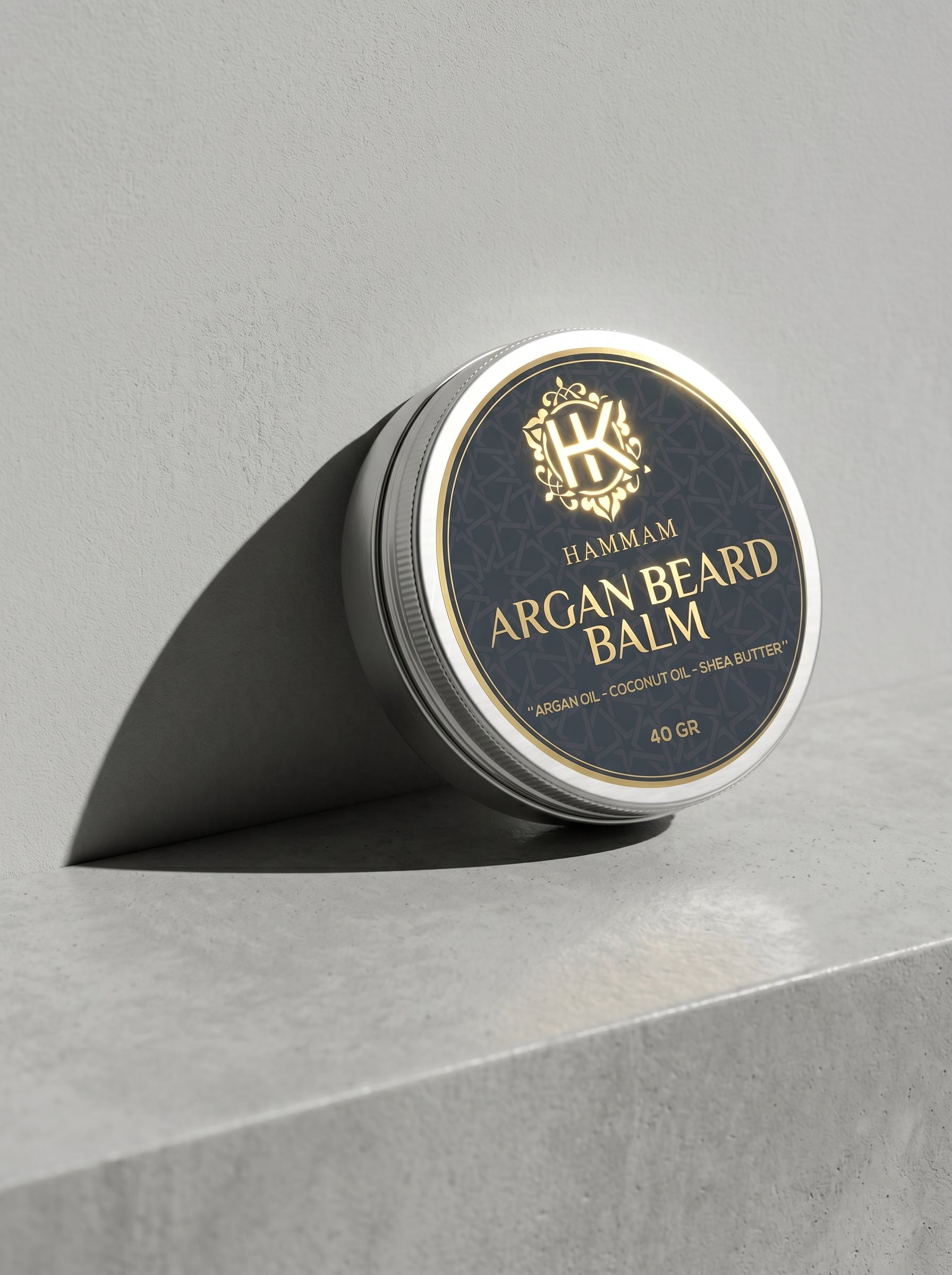 Hammam Argan Beard Balm container on a gray surface