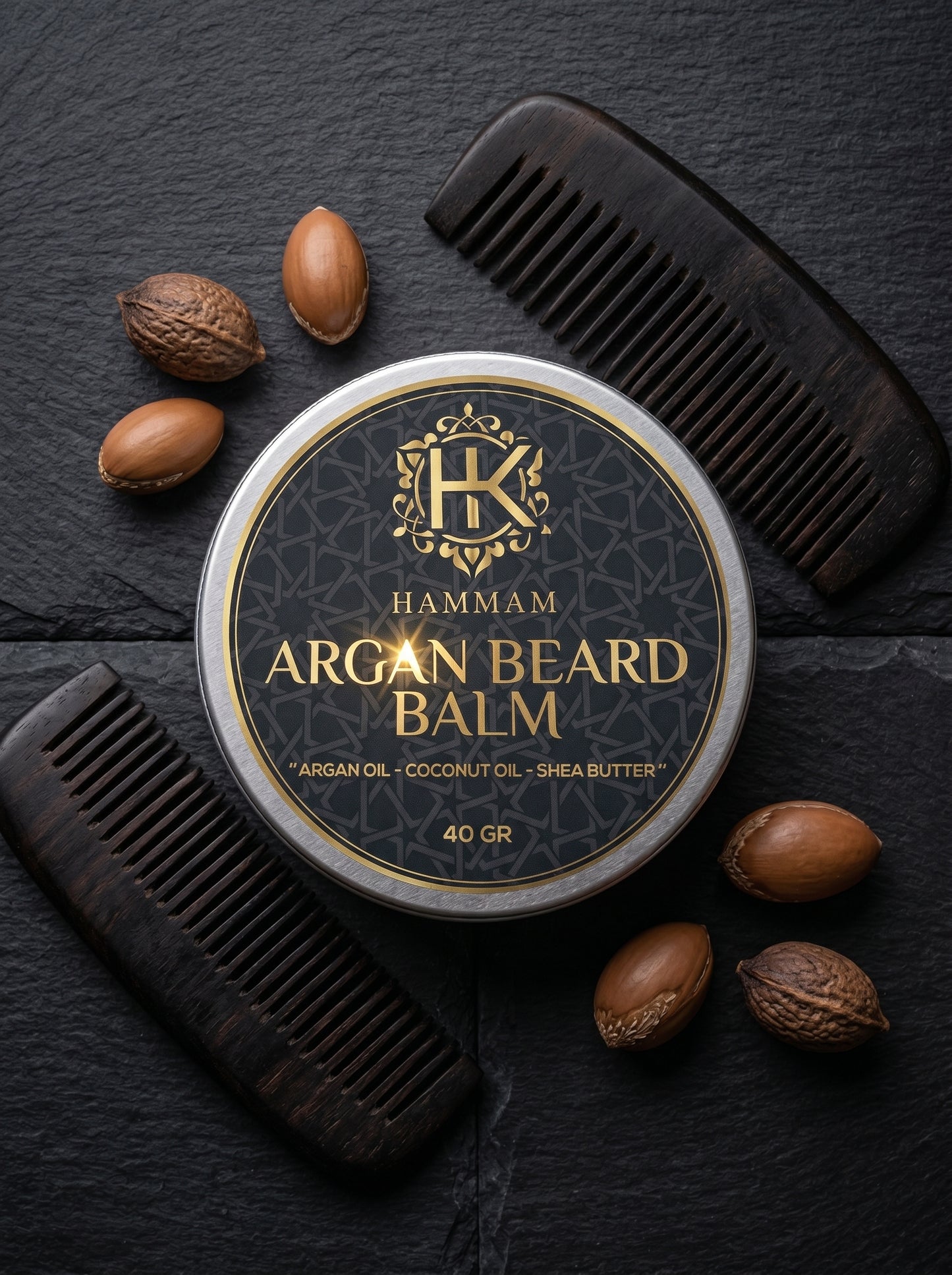 Hammam Argan Beard Balm container with combs and argan nuts on a dark background