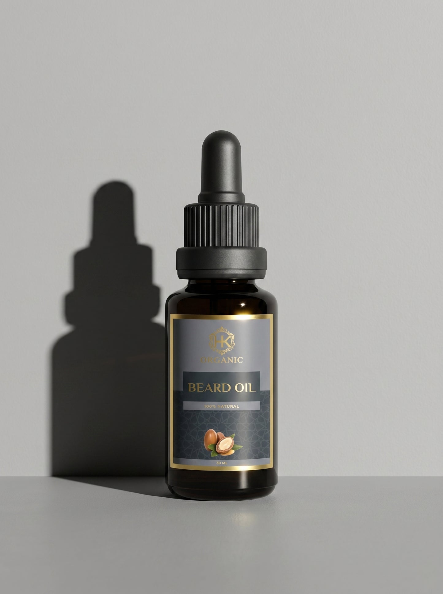 Bottle of beard oil with dropper on a gray background