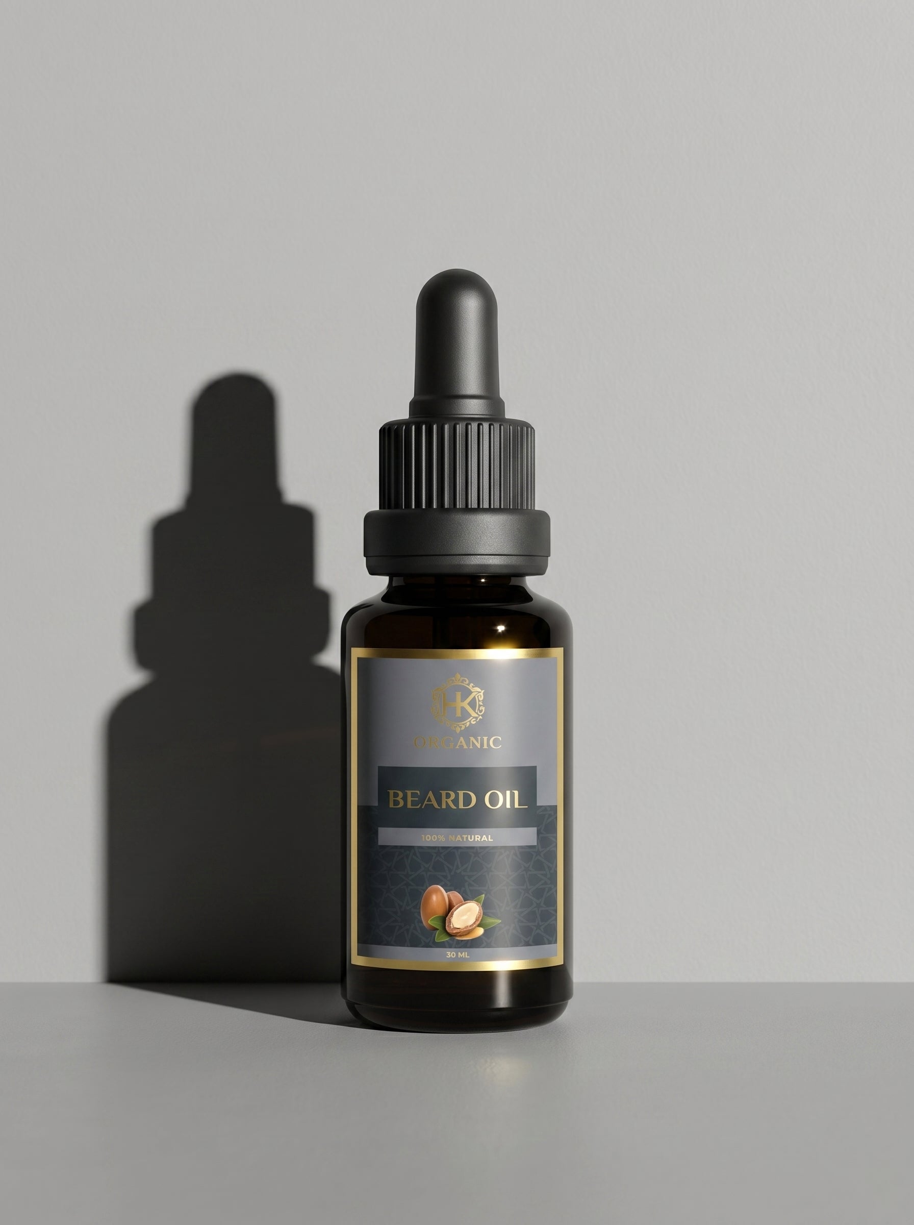 Bottle of beard oil with dropper on a gray background