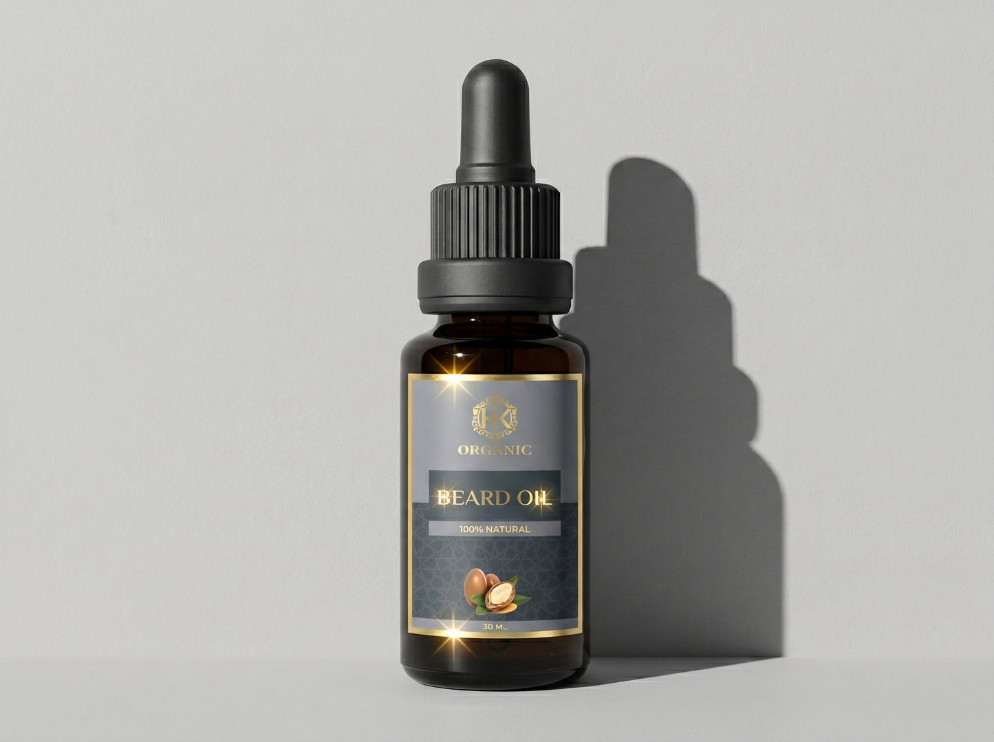 Bottle of beard oil with dropper on a gray background