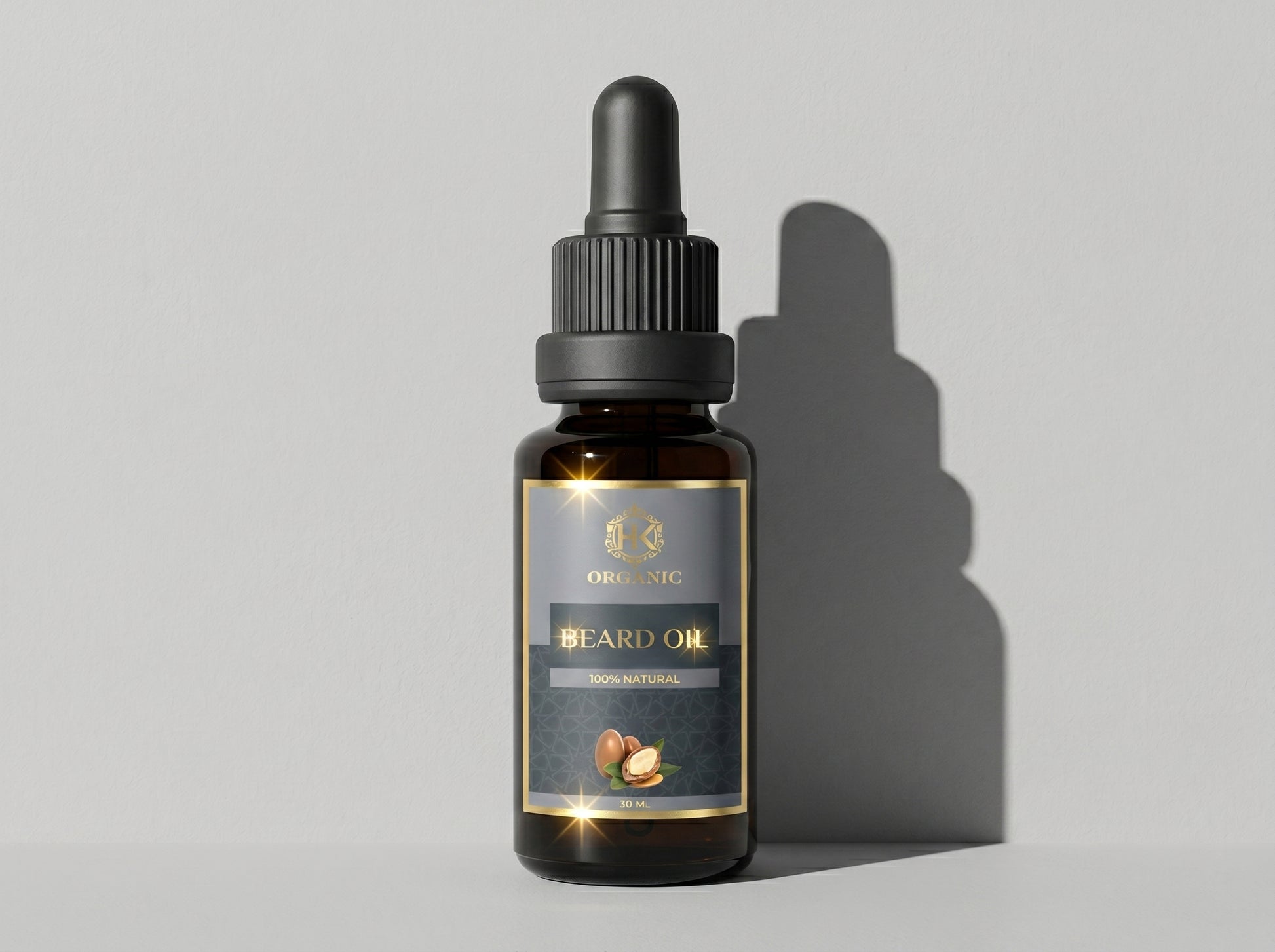 Bottle of beard oil with dropper on a gray background