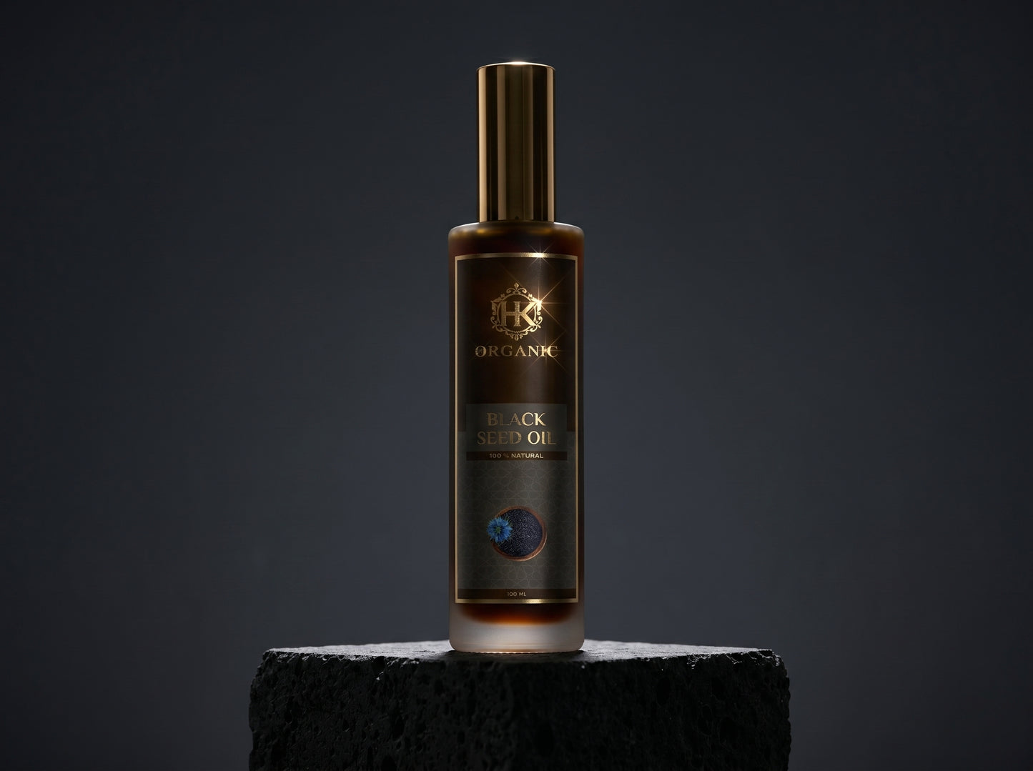 Bottle of black oil with a dark background