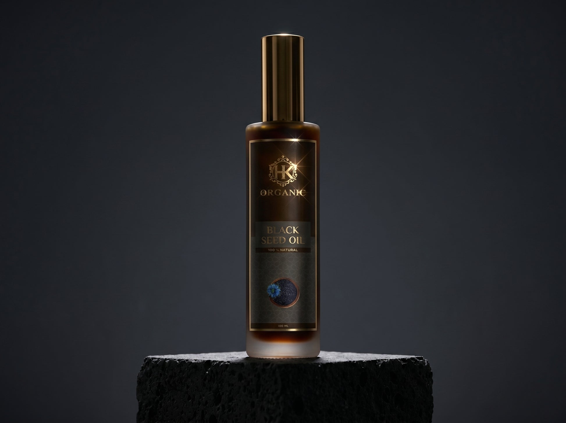 Bottle of black oil with a dark background