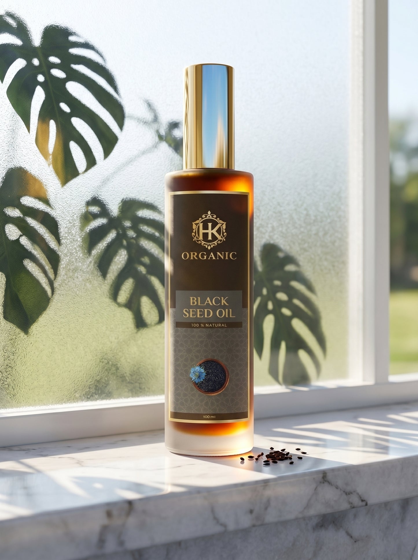 Bottle of organic black seed oil on a windowsill with plant shadows.