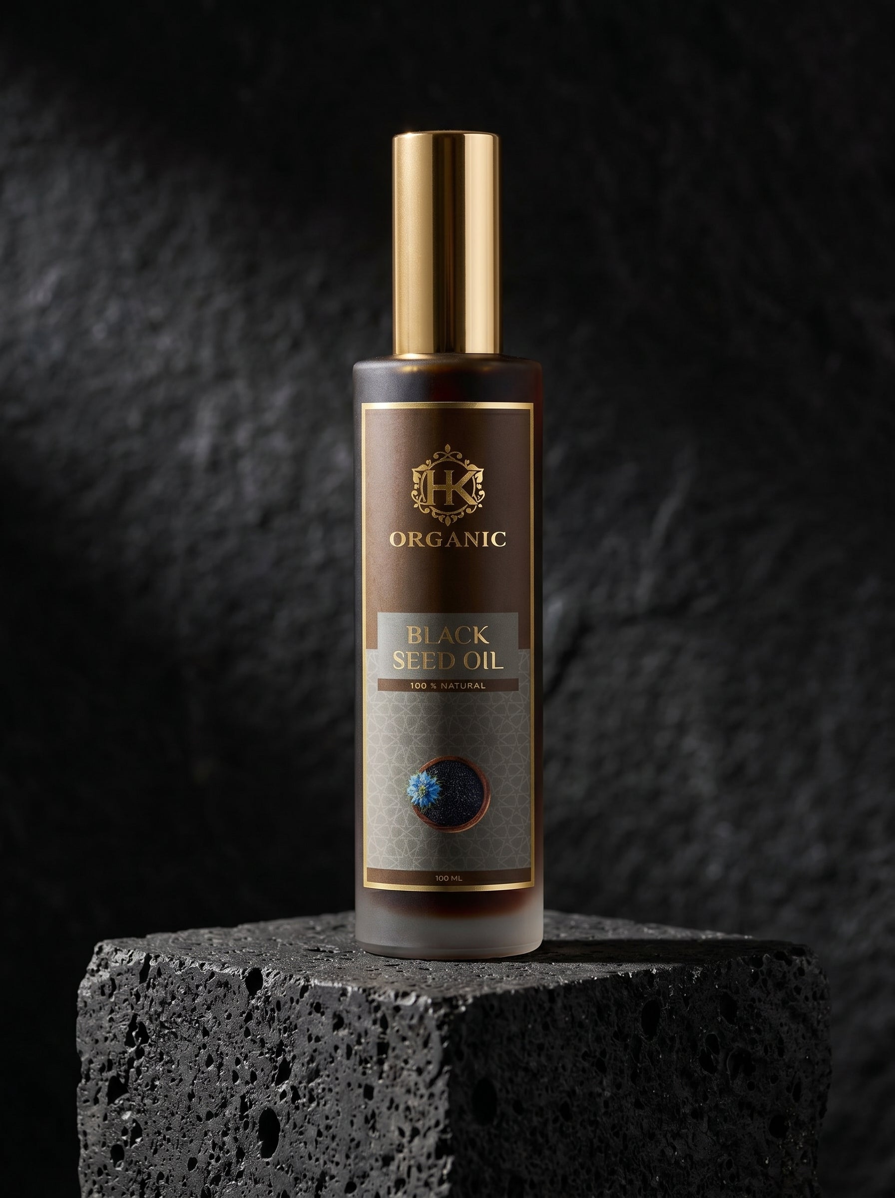 Bottle of organic black seed oil on a dark background
