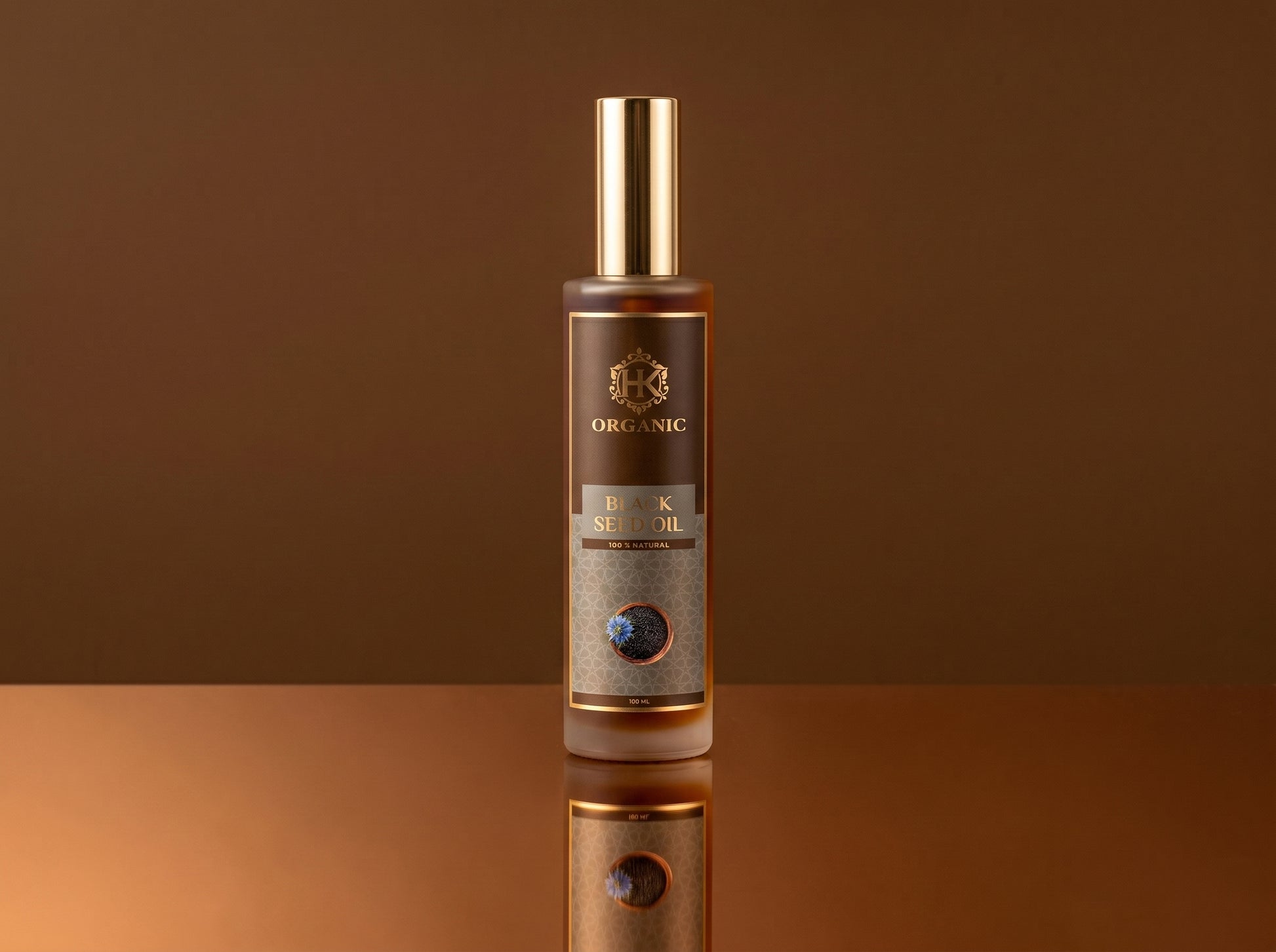 Bottle of organic dark seed oil on a reflective surface with a brown background