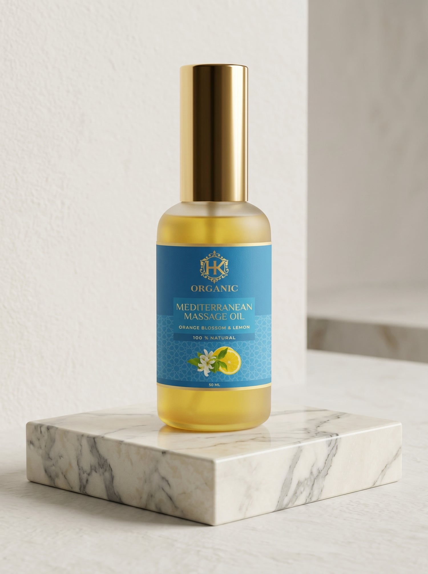 Bottle of Mediterranean Massage Oil on a marble surface with a light background