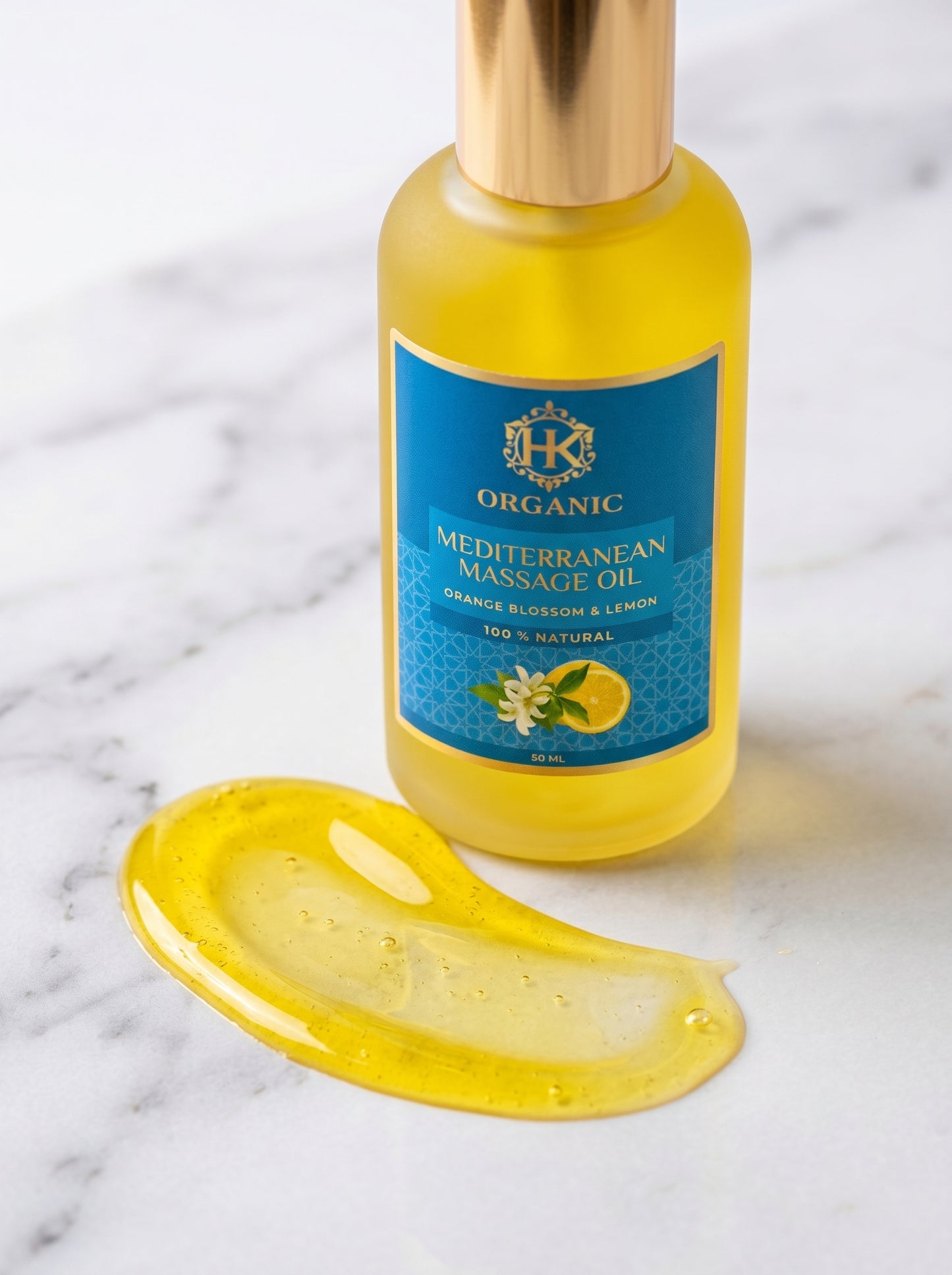 Mediterranean massage oil bottle with a droplet of oil on a marble surface