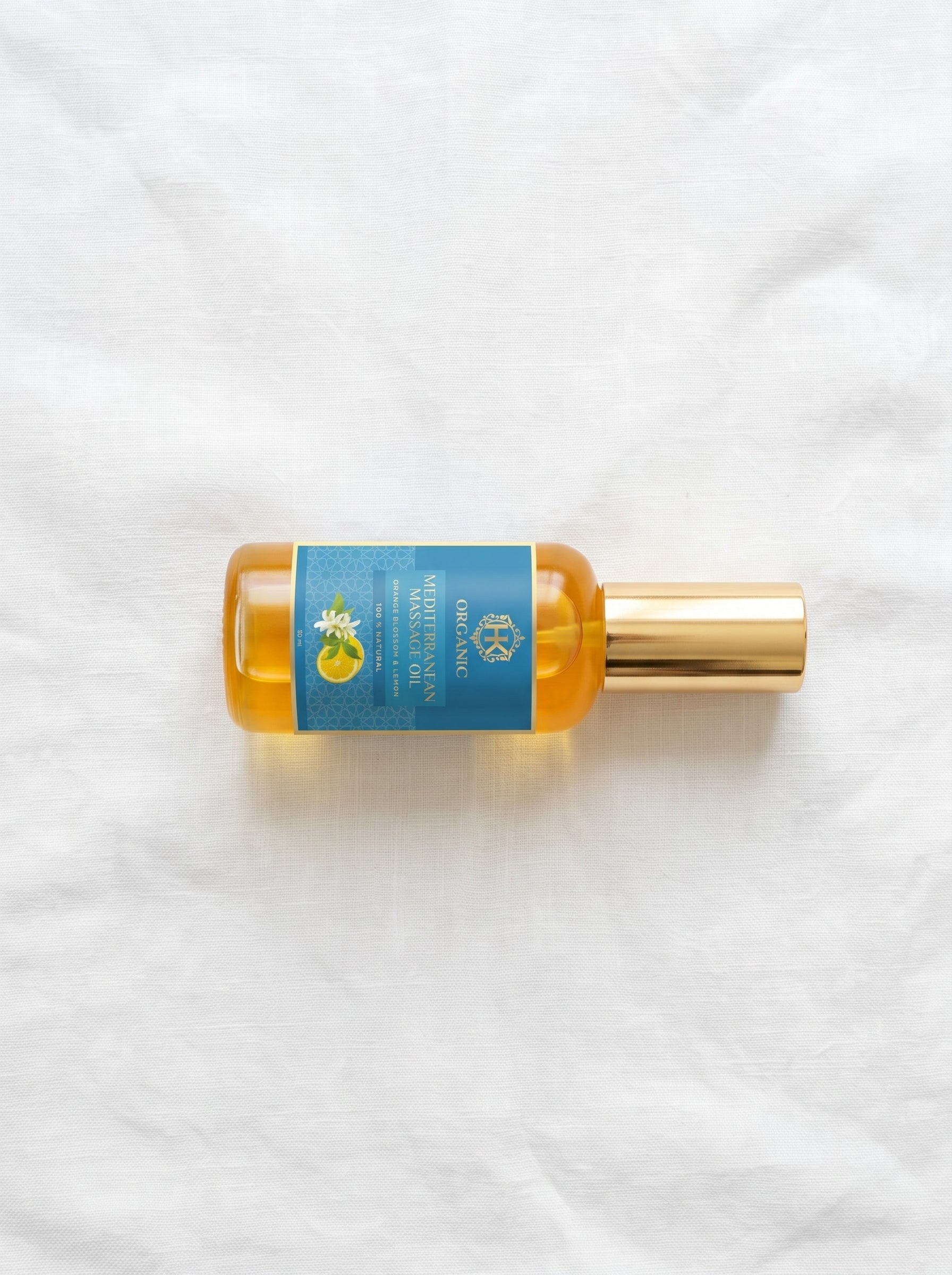 Bottle of perfume with a blue label on a white background
