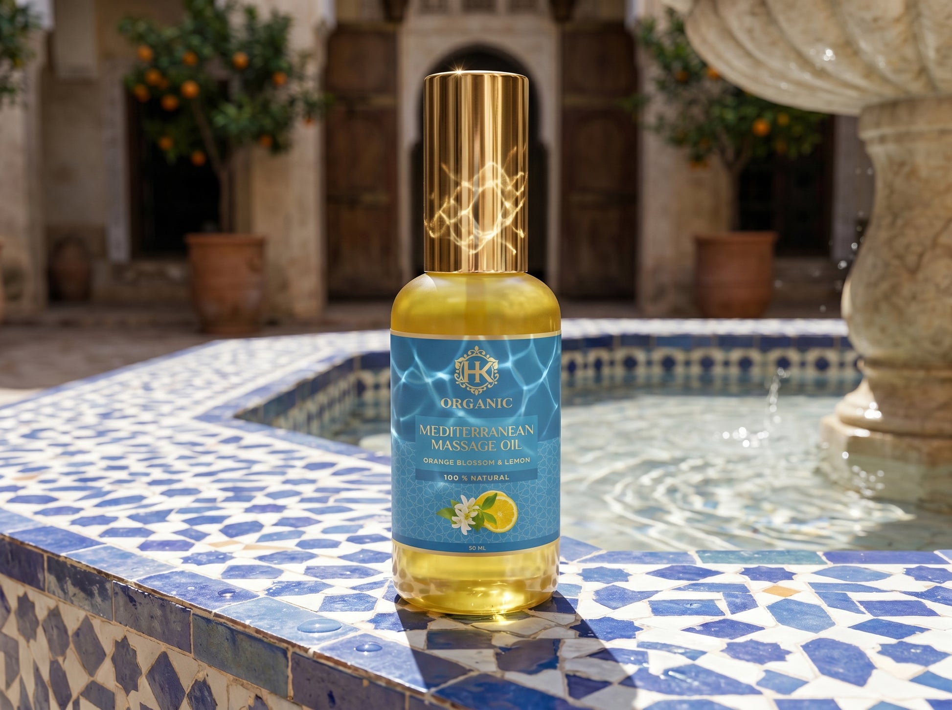 Bottle of Mediterranean Massage Oil on a mosaic-patterned surface with a blurred background