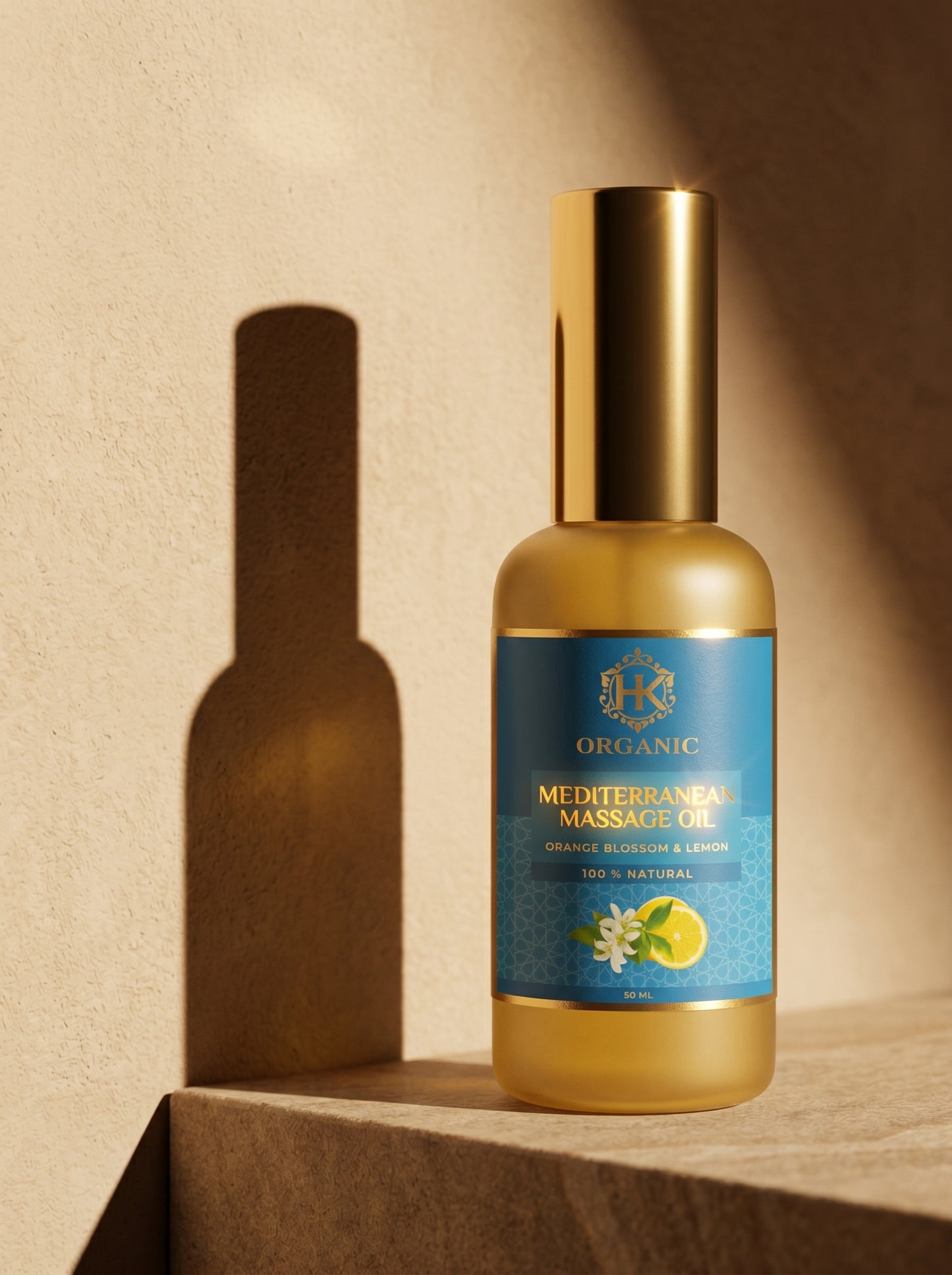 Gold bottle of Mediterranean Massage Oil with blue label on a beige background