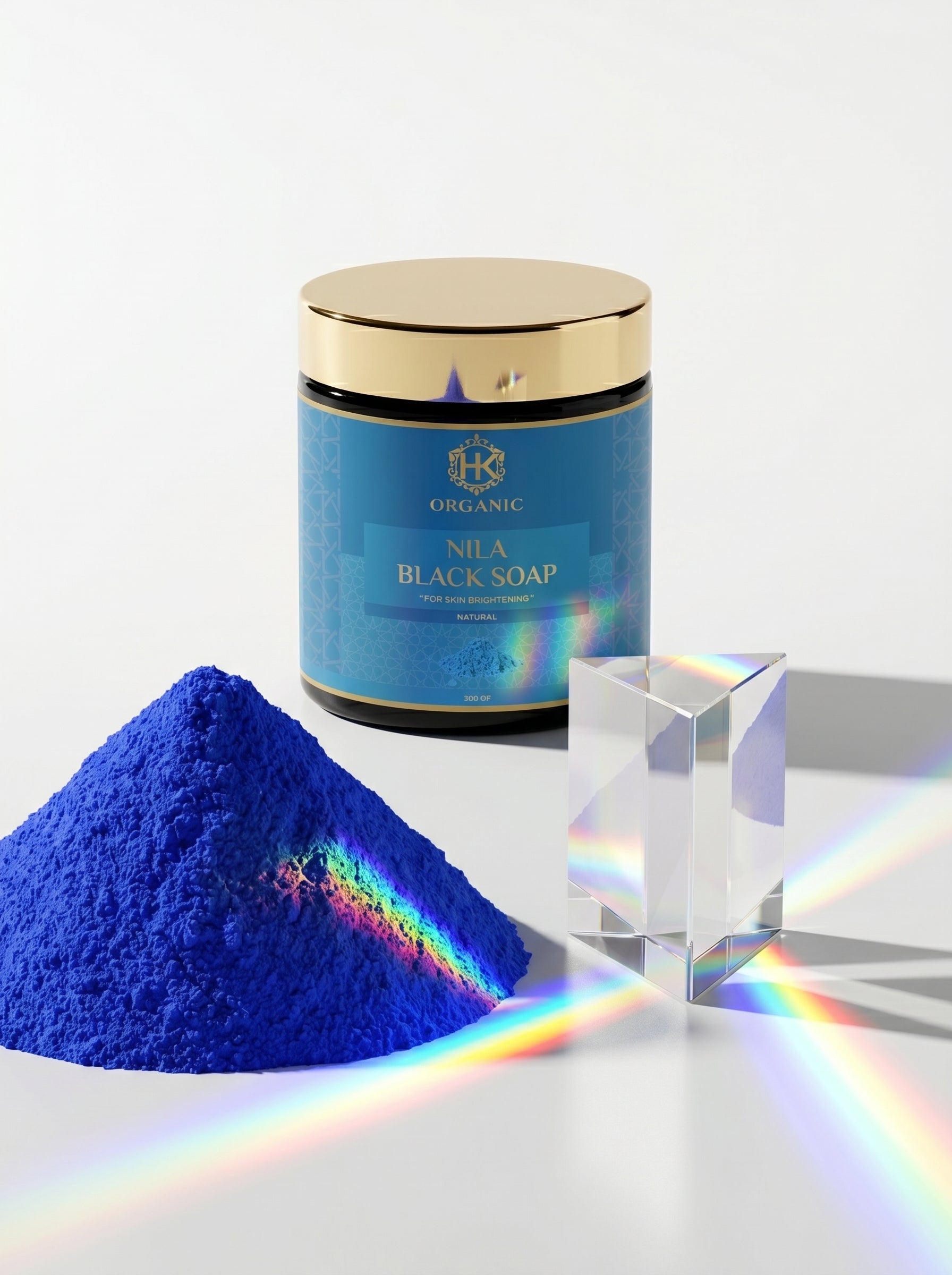 Blue powder with a container labeled 'Nila Black Soap' on a white background