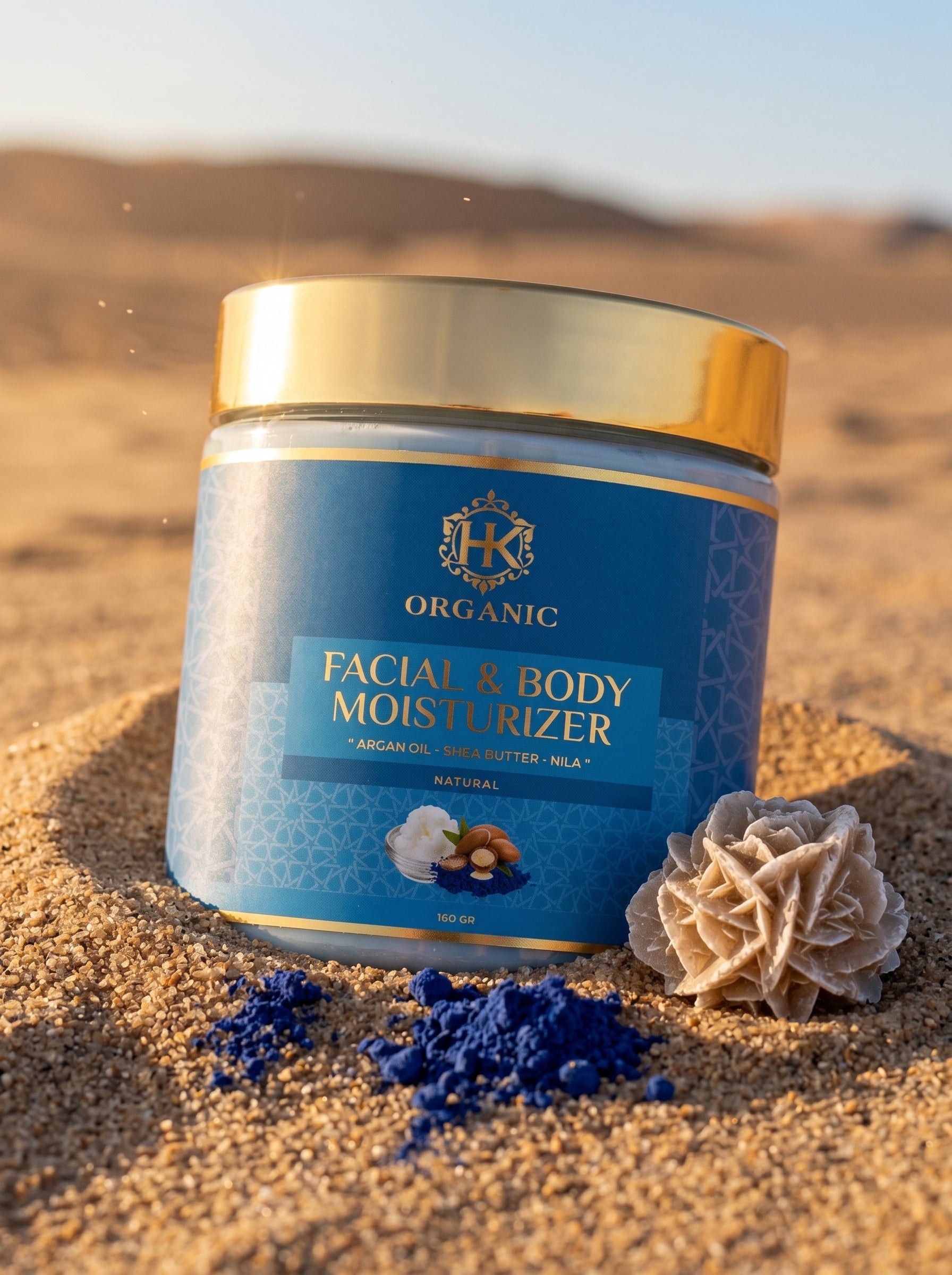 Facial and body moisturizer jar with decorative elements on a sandy background