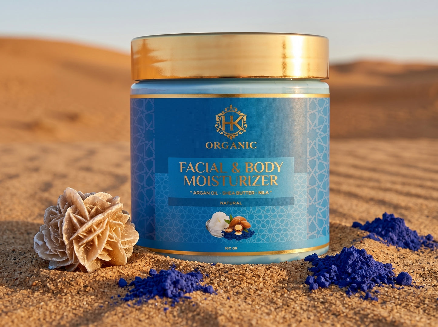 Facial and body moisturizer jar with blue label on sand