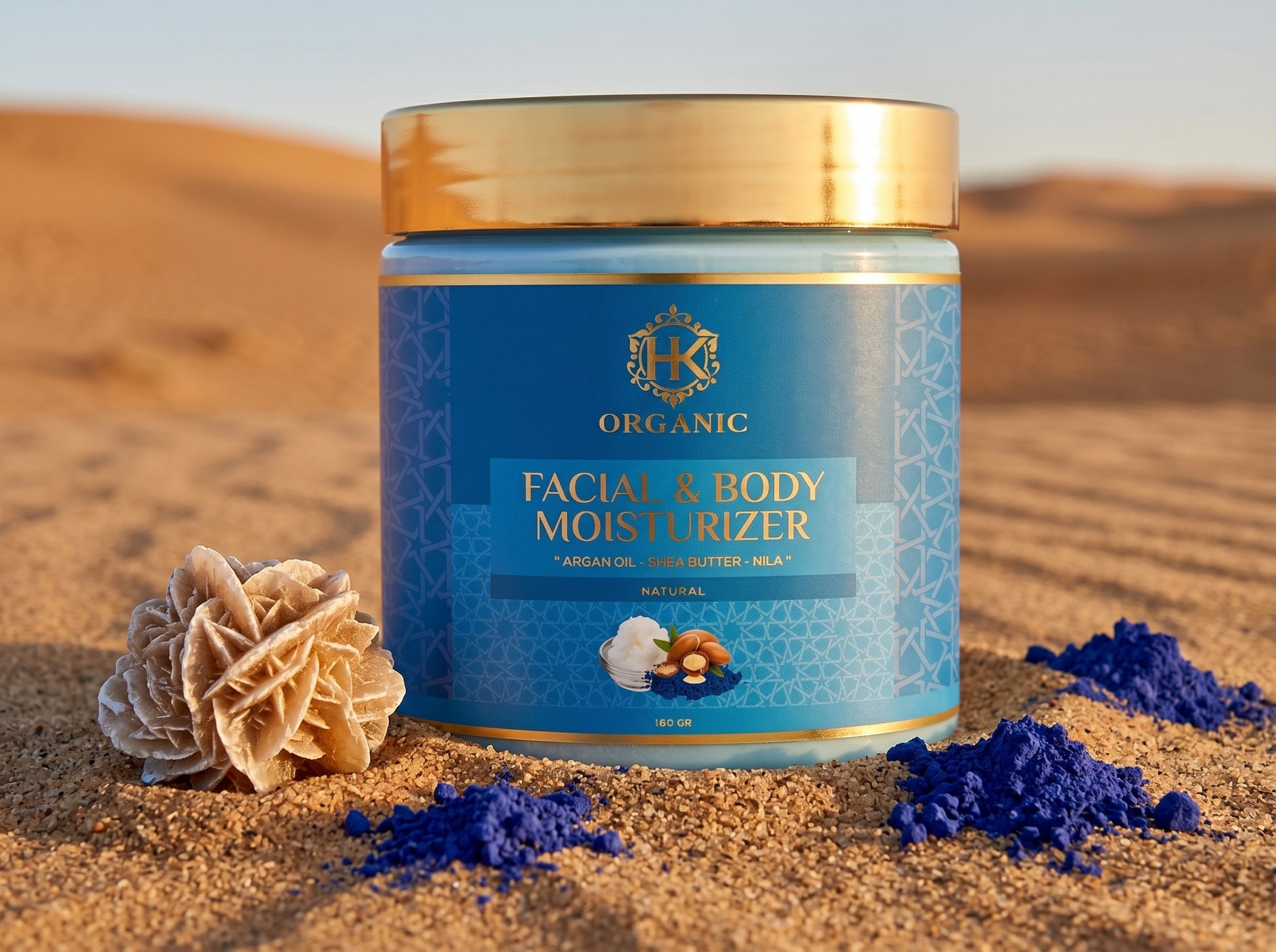 Facial and body moisturizer jar with blue label on sand