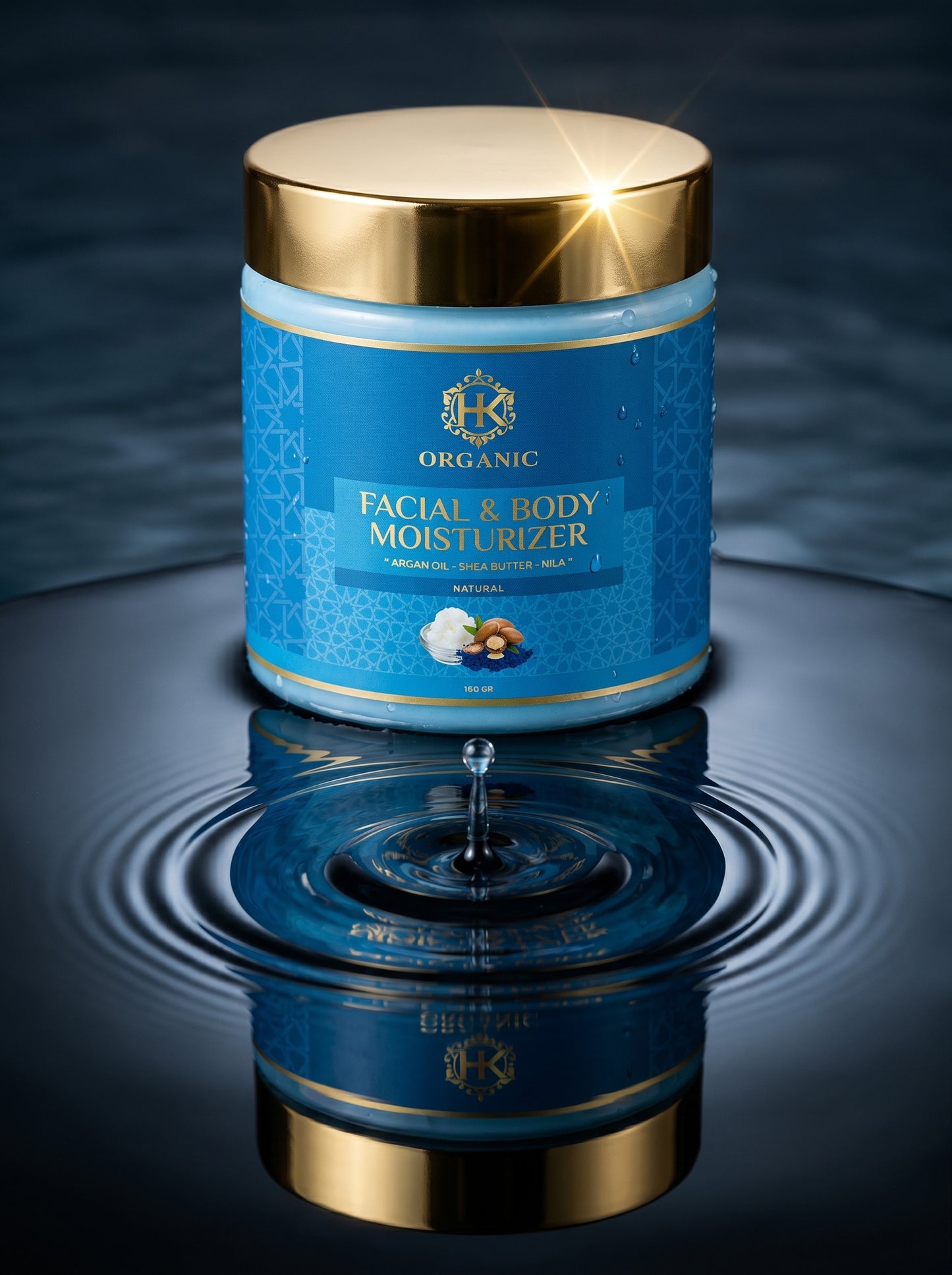 Blue jar of facial and body moisturizer with gold lid on a reflective surface