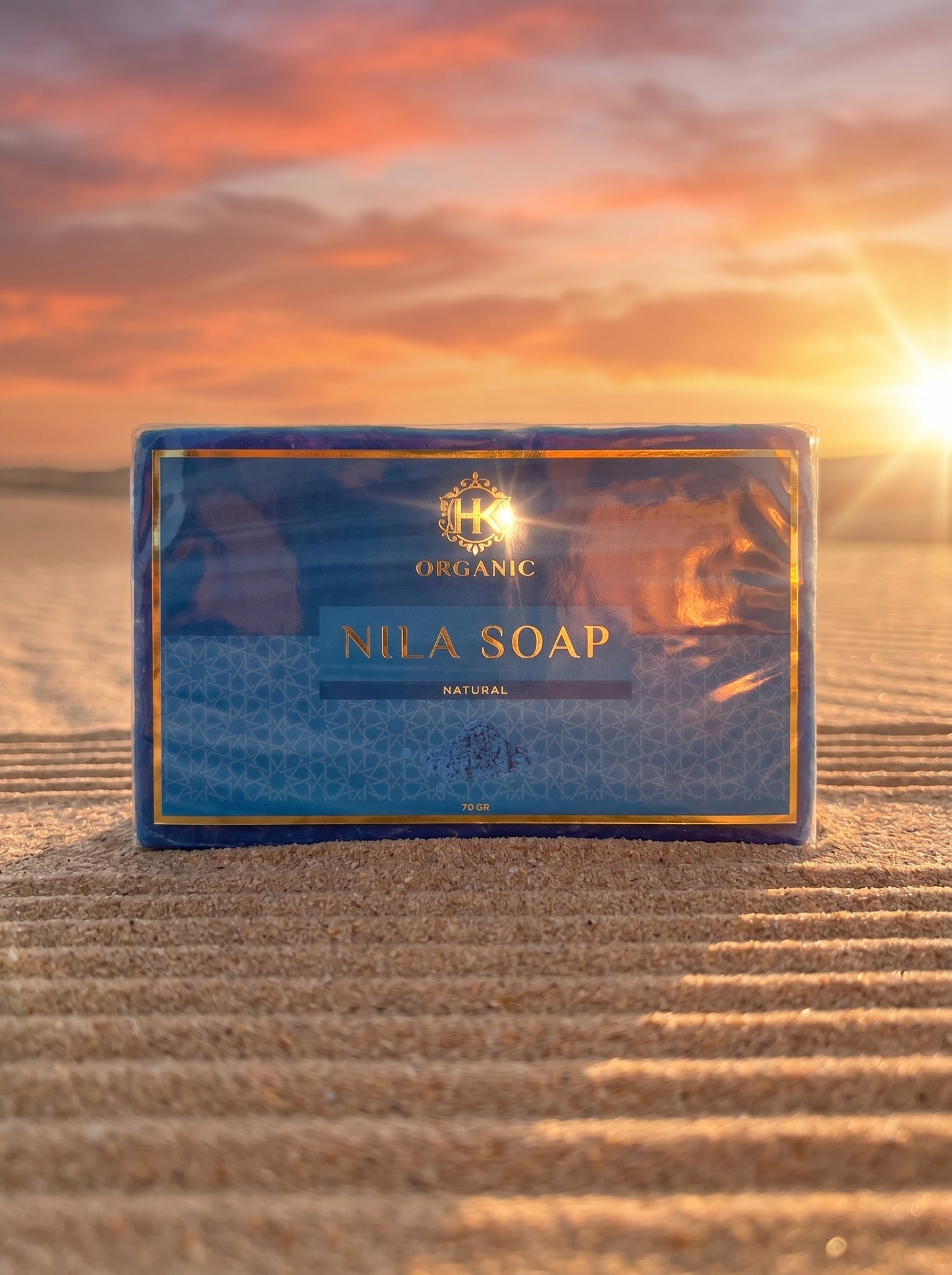 Nila Soap packaging with a sunset background