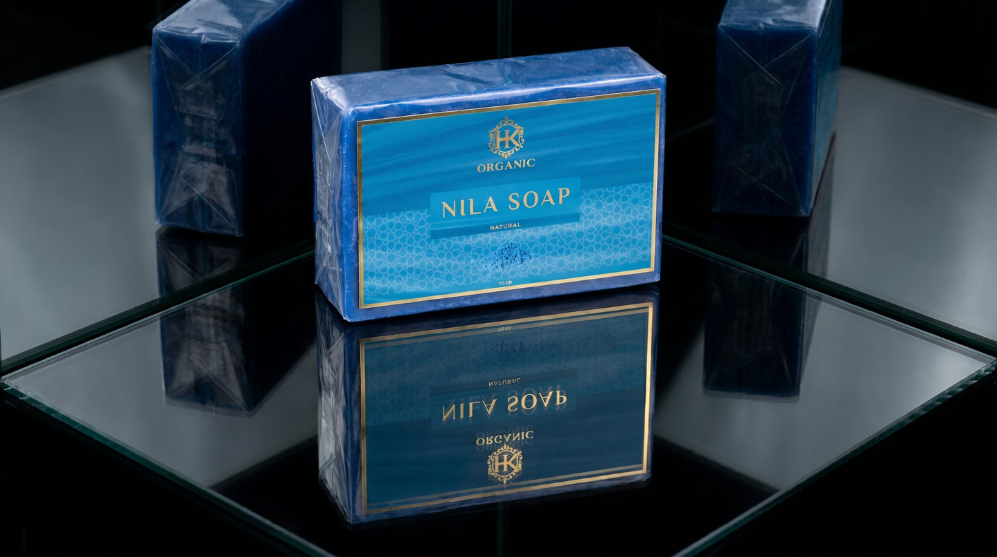 Blue soap with 'Nila Soap' branding on a reflective surface
