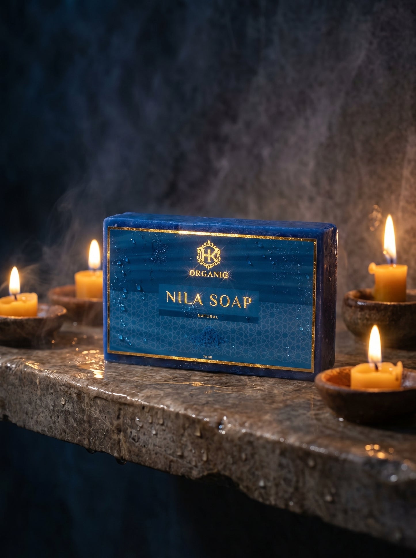 Blue Nila Soap bar with candles on a dark background