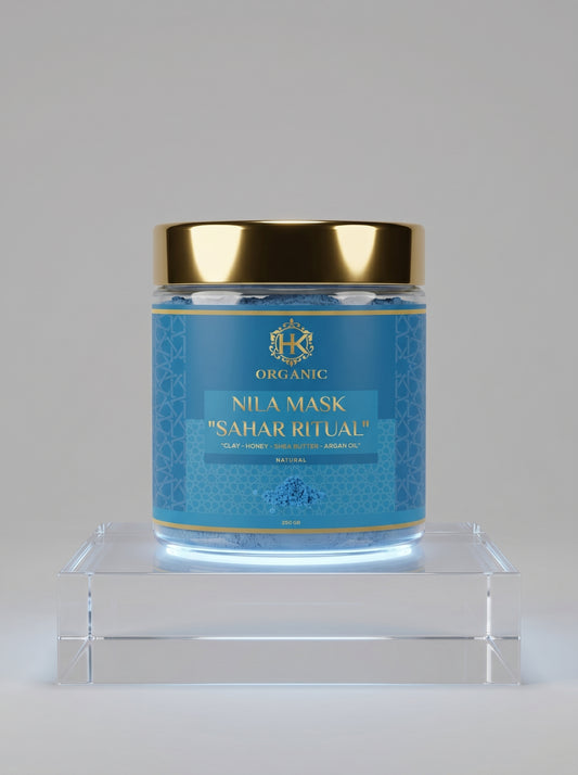 Blue jar with gold lid on a gray background
