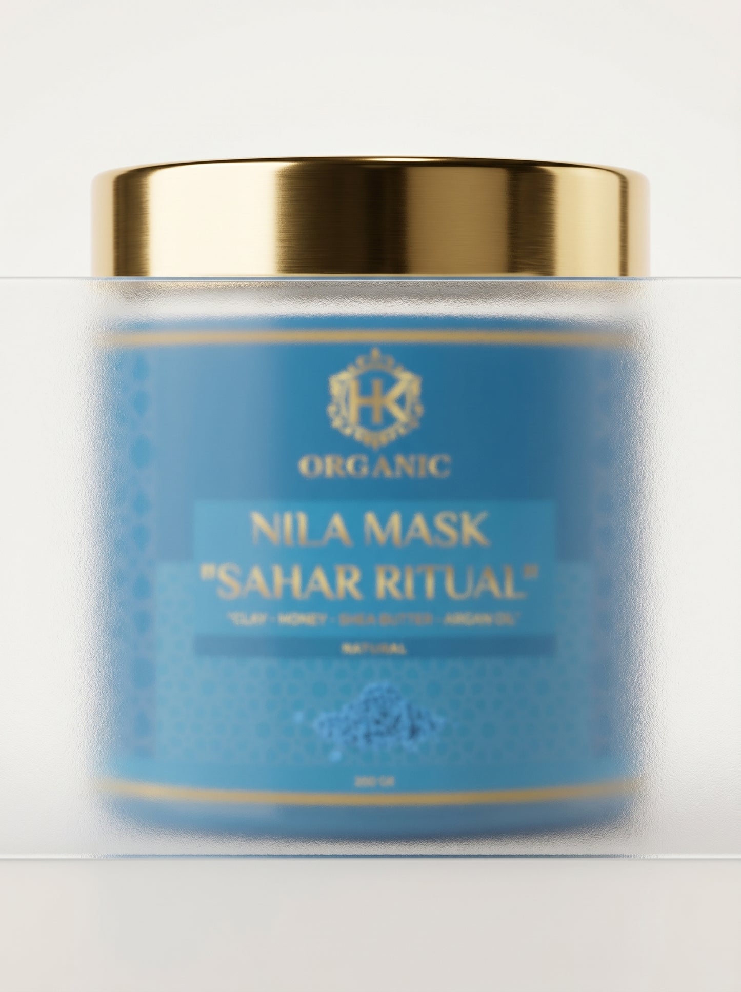 Blue jar of Nila Mask 'Sahar Ritual' with gold lid on a white background