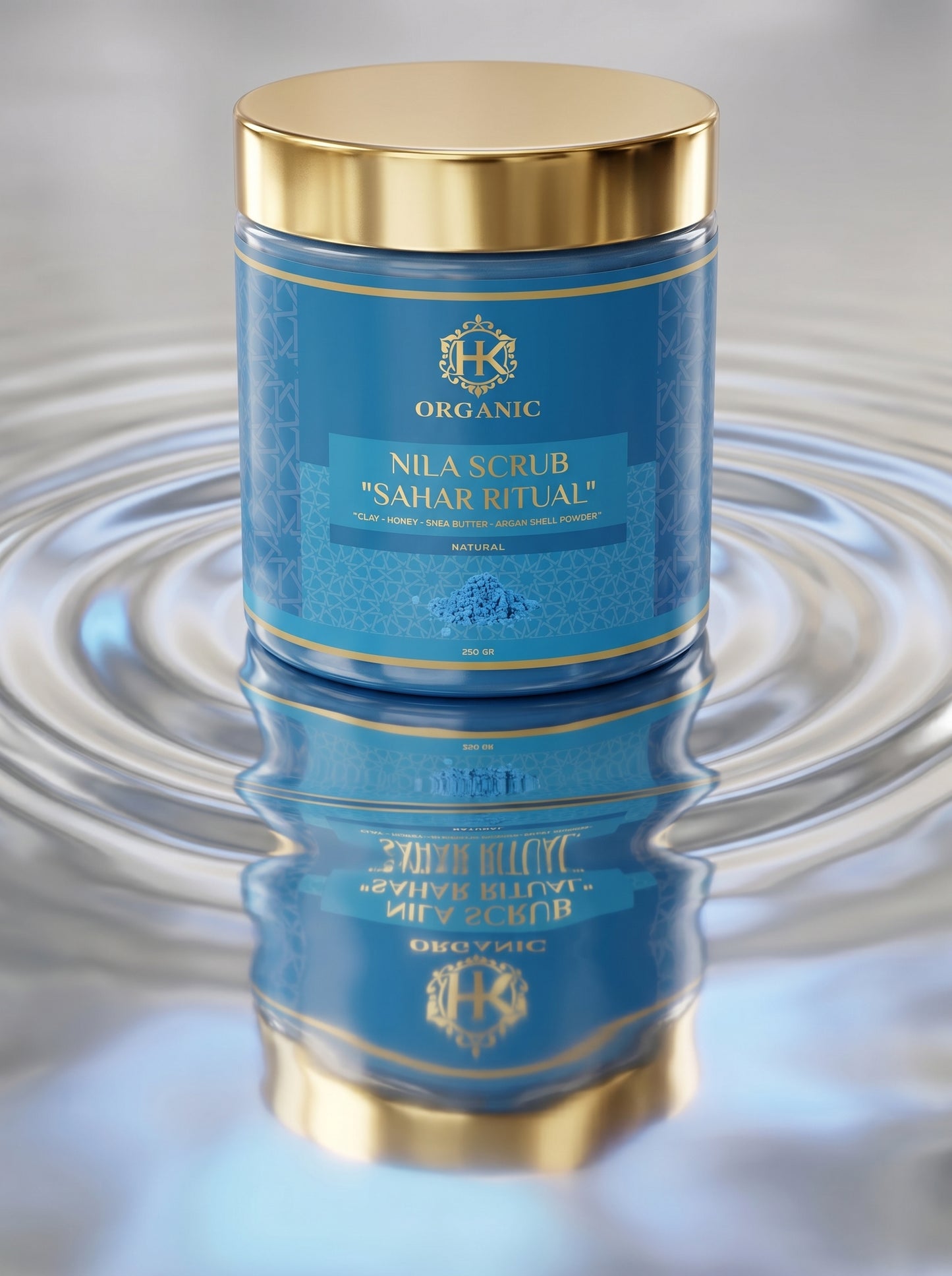 Blue jar with gold lid on a reflective surface
