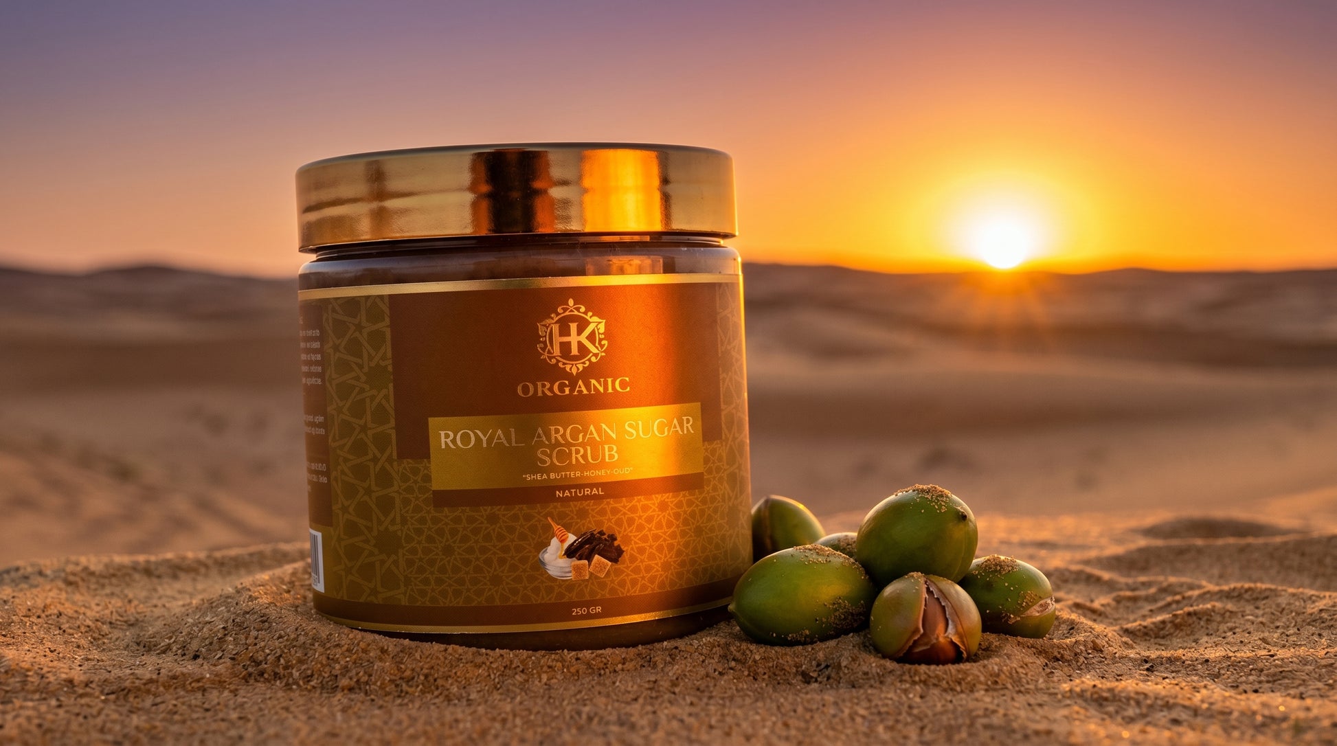 Jar of organic argan oil scrub with argan nuts on sand at sunset