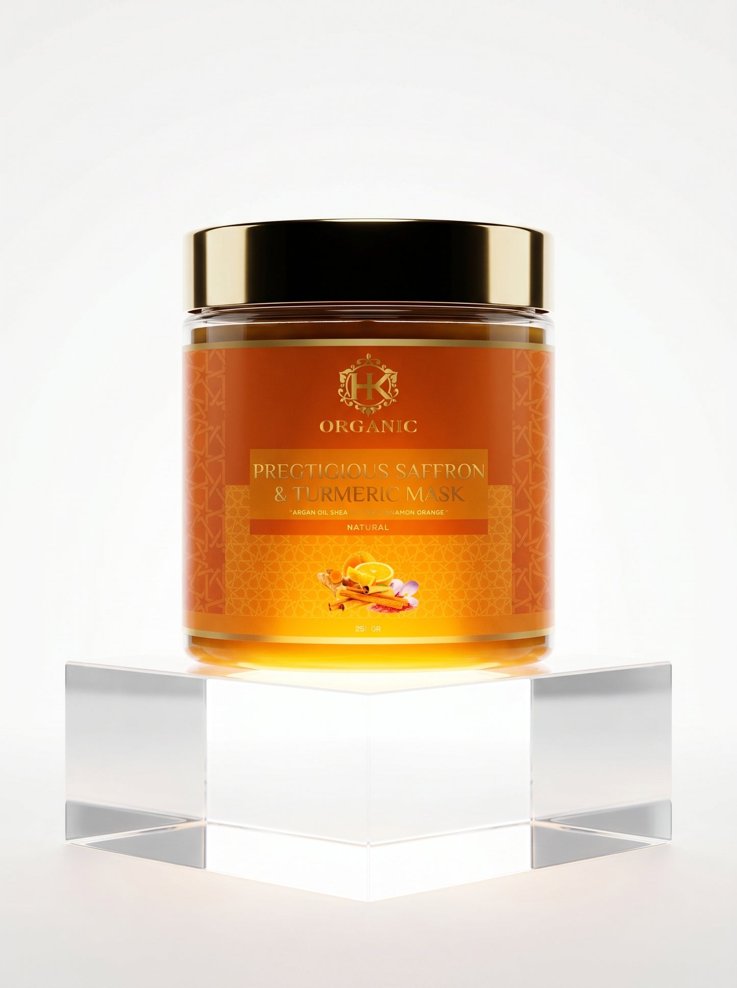 Jar of organic face mask with gold lid on a white background
