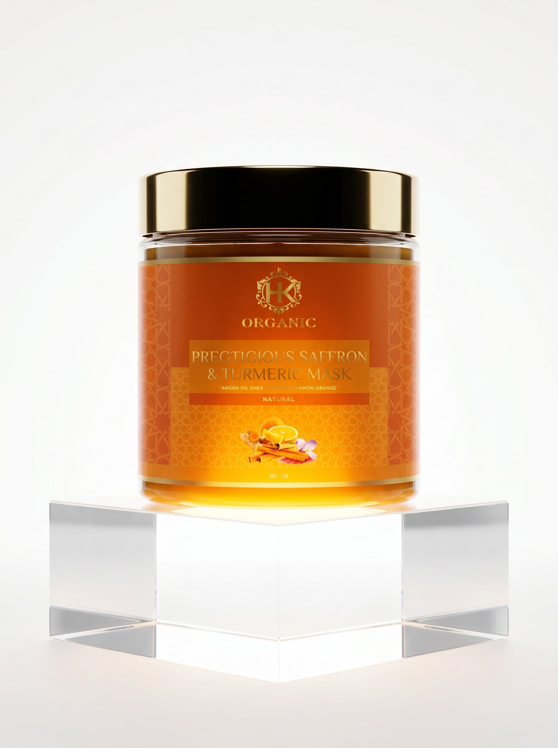 Jar of organic face mask with gold lid on a white background