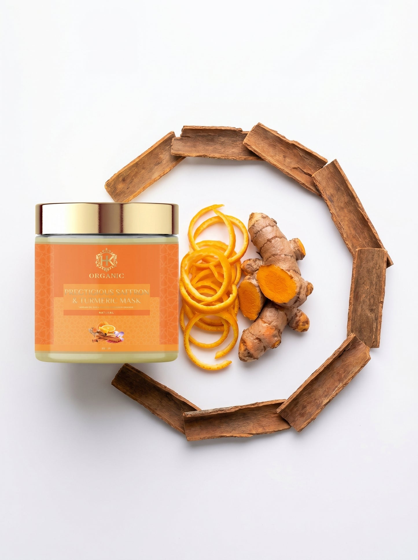 Jar of turmeric cream with turmeric roots on a white background