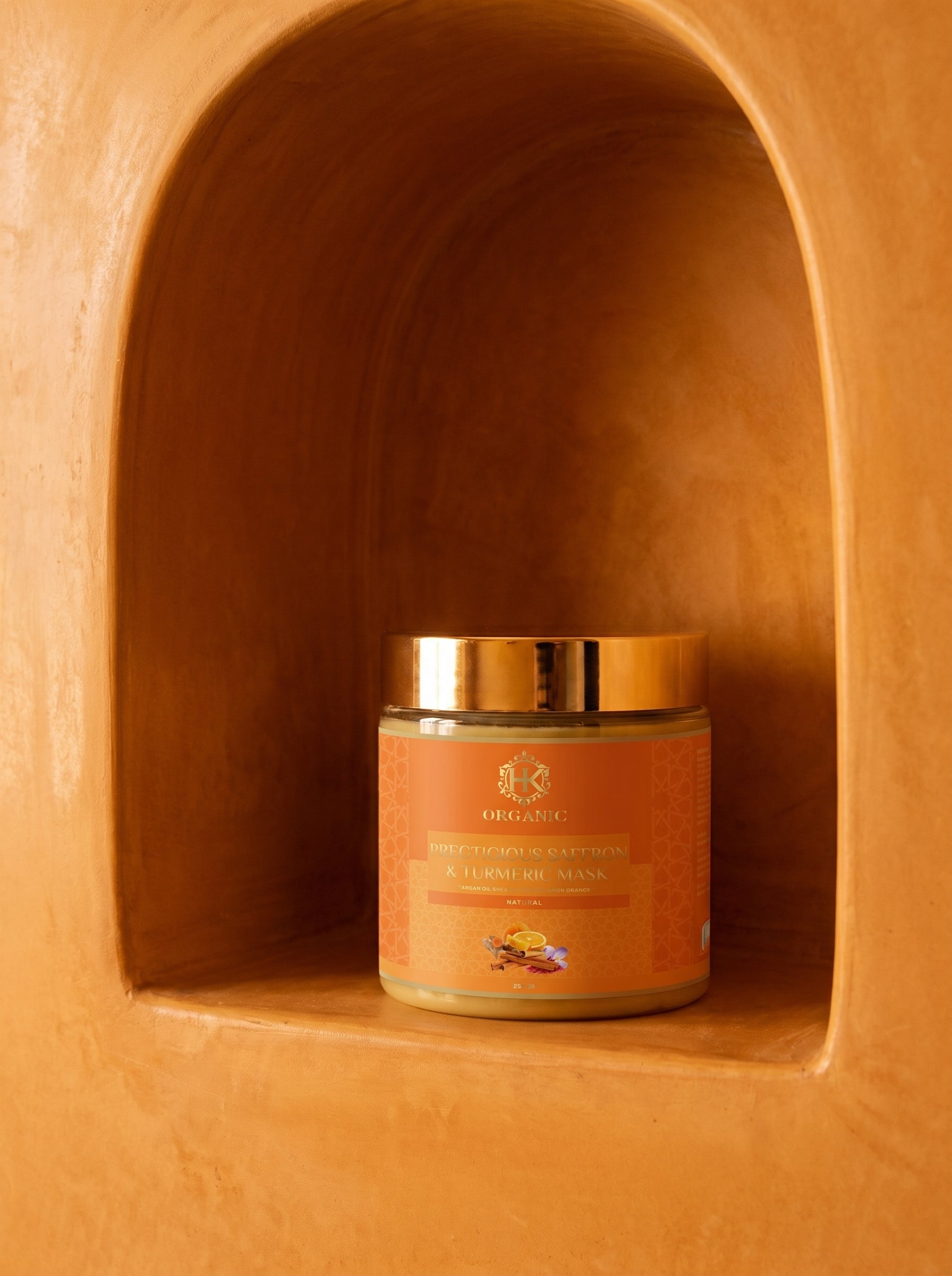 Jar with a gold lid on a wooden shelf