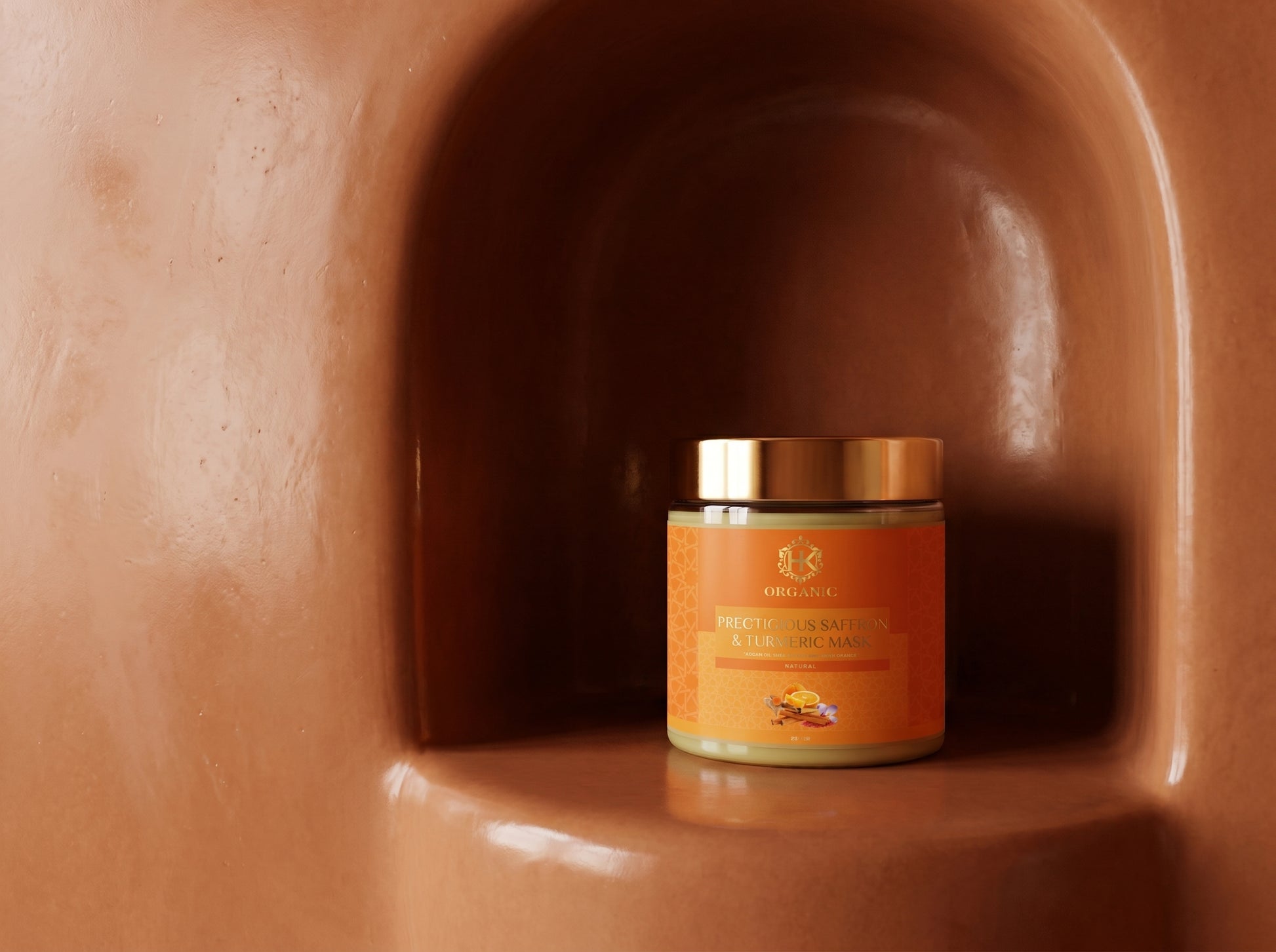 Jar of turmeric on a brown textured surface