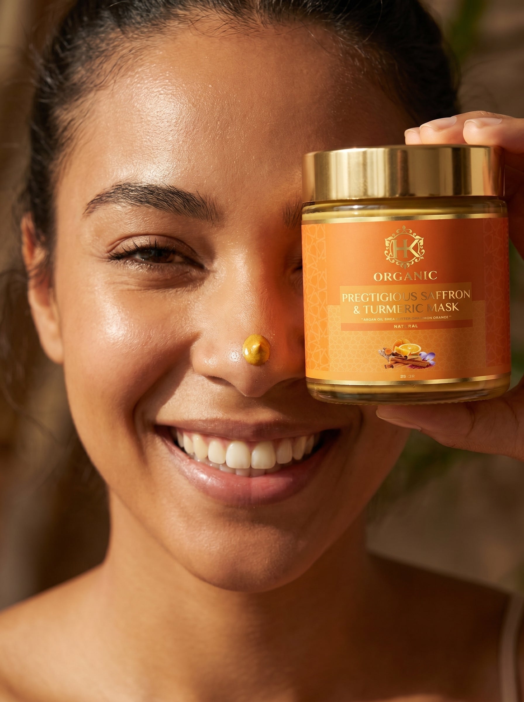 Woman holding a jar of organic face mask with a blurred background